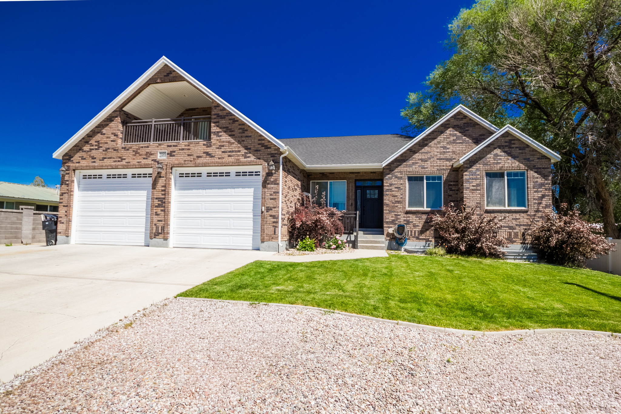 Welcome to this spacious 6-bedroom, 4-bathroom home in the highly desirable Maeser area, offering 4,796 square feet of comfortable living space and endless potential. The beautifully remodeled kitchen is the heart of the home, featuring double ovens, a magnetic induction range, abundant cabinetry, and generous workspace for cooking and entertaining. The seller is offering a $10,000 credit toward countertops, allowing buyers to personalize the kitchen with the finish of their choice. The oversized primary suite provides a private retreat with a luxurious en-suite bathroom.  Downstairs, the unfinished basement is already plumbed for a separate kitchen, creating incredible opportunities for a future mother-in-law apartment, guest suite, or additional living space. Car enthusiasts, hobbyists, and those needing extra storage will appreciate the extra-deep and extra-wide garage, complete with 220-volt wiring. With ample square footage, flexible living spaces, and room to grow, this home combines modern updates with future possibilities in one of the area's most sought-after neighborhoods. Square footage figures are provided as a courtesy estimate only and were obtained from County Records & previous Appraisal .  Buyer is advised to obtain an independent measurement.