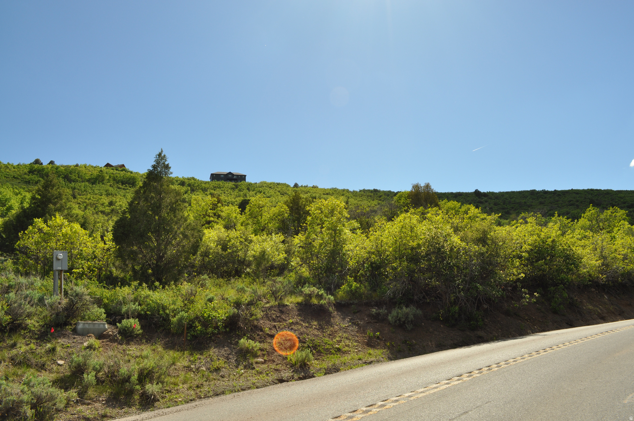 Oversized (2 acres!) uphill lot in Timber Lakes with no backyard neighbors is ready to build! Located 1/2 mile in from the main gate on a paved road on the main plow route for easy year-round access. Roads are well-maintained year-round too. All your due diligence has been done for you! Completed survey, perc test, site plan and approved septic design for a 3 bedroom house. House plans are negotiable! Water and power are in the road and propane is available. Timber Lakes is a gated, private mountain home community close to world-class skiing, snowmobiling, 108 holes of golf, blue ribbon fly fishing and year-round water activities. Private access to snowmobiling trails directly from Timber Lakes in the winter! Miles and miles of ATV-friendly roads/trails. Bring your toys for year-round recreation! Seven miles east of Heber City, 24 min to Deer Valley East Village opening this winter, 30 min from Park City and Provo, 52 min to SLC airport. This is your special place!!