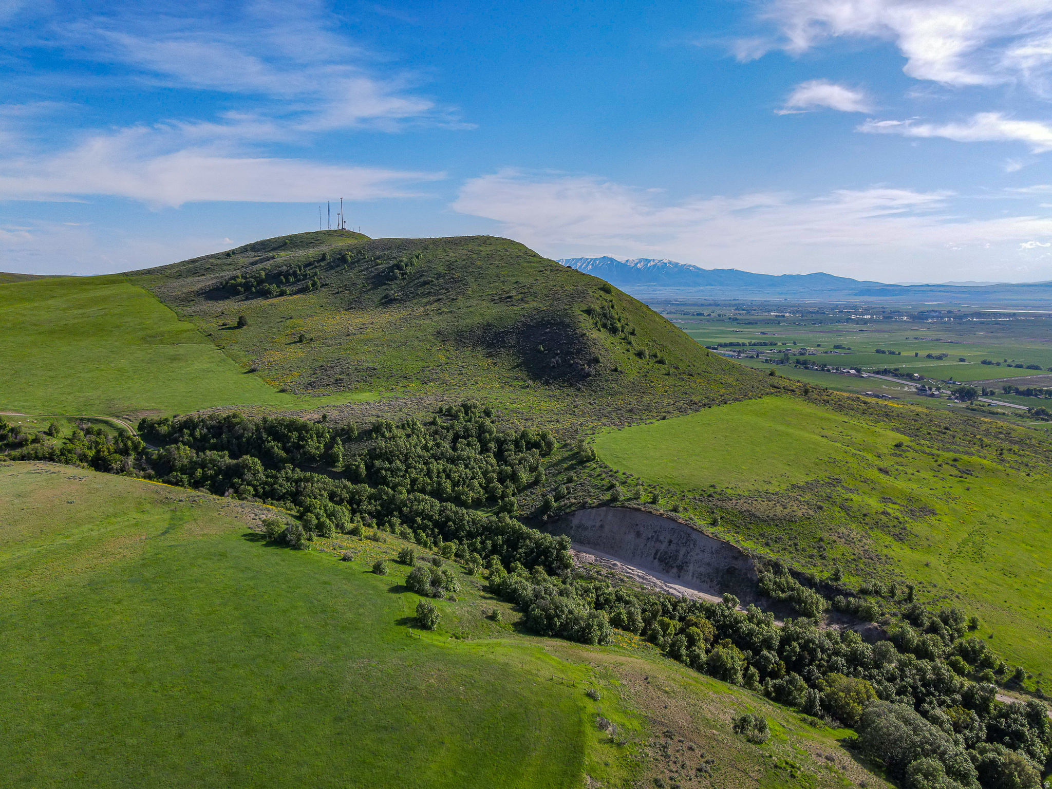 Escape to your own private paradise! This stunning 160-acre parcel on the north face of Crow Mountain is the perfect setting for your dream home estate! Enjoy complete seclusion, breathtaking views, and a wealth of opportunities. With 180 degree views of Cache Valley, abundant wildlife, and lush greenery, this property offers a true retreat from the hustle and bustle. Take advantage of the abundance of on-site gravel to construct your ideal home, saving you valuable time and money! The elevated location provides fresh mountain air and a sense of tranquility that's hard to find. Included with the sale is an approved well permit providing 1.73 ACFT of water for the new owner to drill their own well. Natural spring is also on the property and is piped underground to service 3 nearby homes. Don't miss out on the chance to create your own slice of heaven in this idyllic location. Whether you're seeking a peaceful escape or a new adventure, this property has undefined potential for you to explore! We kindly ask that all showings be scheduled by permission only. Private property signs are posted for your safety and the protection of the property, so please reach out to the listing agent to obtain permission before visiting the property. If you are represented by a buyer's agent, please coordinate all showings through them. For unrepresented buyers, we ask that you coordinate directly with the listing agent. We have provided all the information as a courtesy to you, the buyer. However, it is your responsibility, along with your buyer's agent if you have one, to verify any and all information to your satisfaction. Thank you for your understanding, and we look forward to assisting you. If you have any questions or need further assistance, please don't hesitate to reach out. .