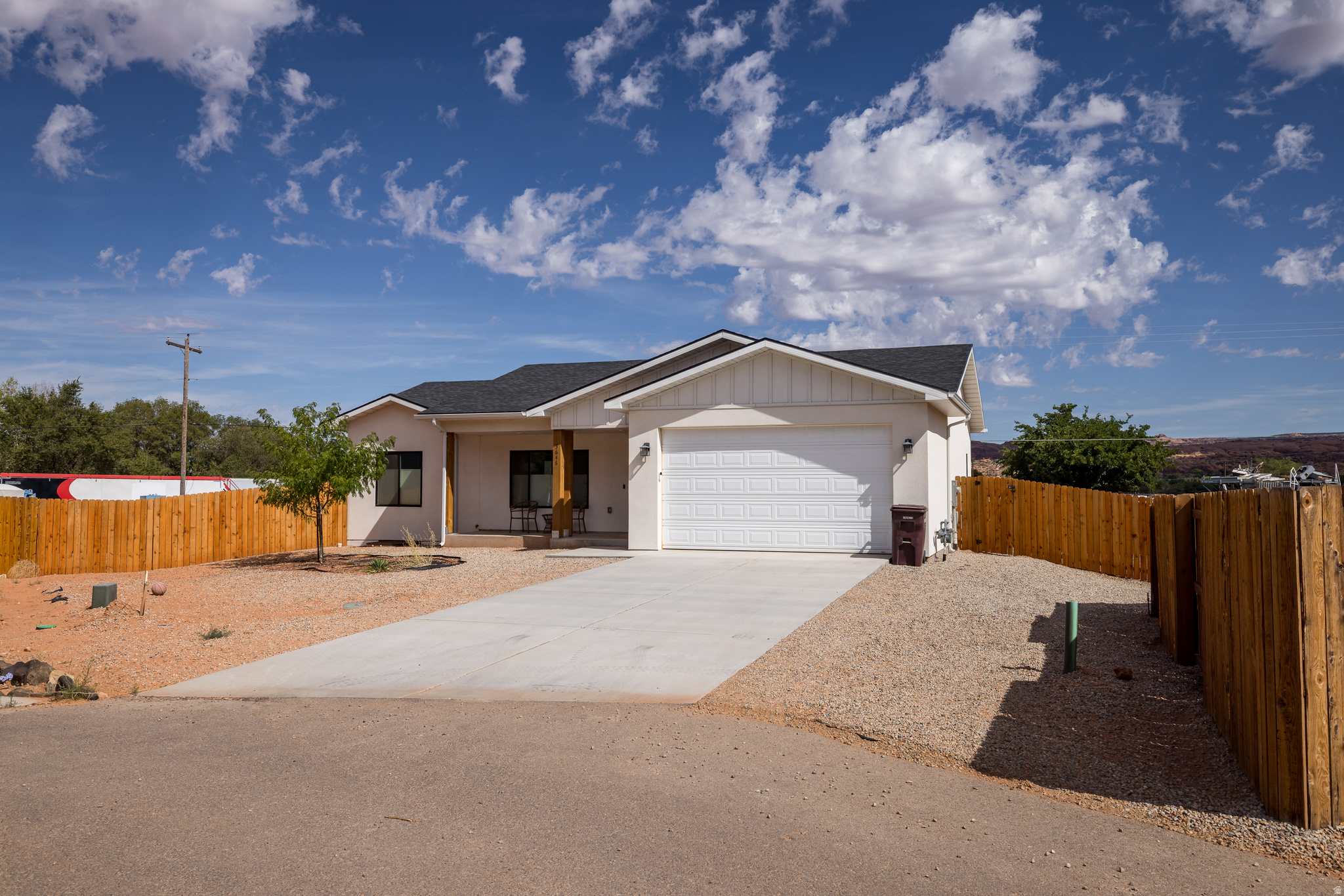 PRICE REDUCED!  Buy this house and have instant equity. Come check out this amazing rambler with tons of space, many upgrades, and views of Moab Rim and the majestic La Sal Mountain Range.  9 foot ceilings on the main level, 8 foot garage height to fit taller cars, granite counter tops, LVP flooring throughout, huge family room downstairs, 5 bedrooms, 3 full bathrooms, and its on a quiet cul-de-sac. Built in 2021 and still looking brand new.  This would be a outstanding home for a family or a second home to come visit and play here in Moab. Furniture negotiable as well.