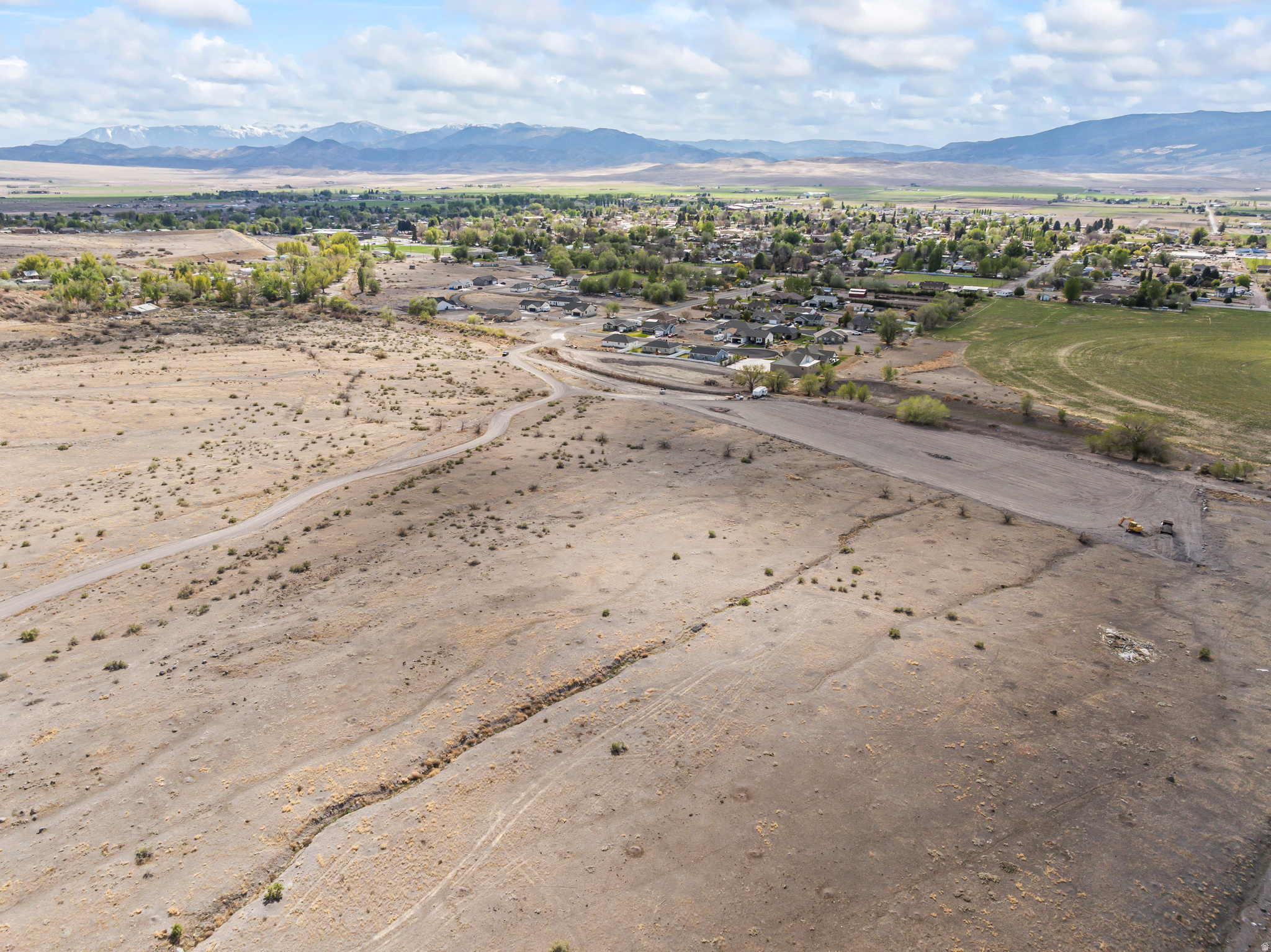 Rare and unique opportunity to own an 8.5-acre parcel on the northeast edge of Monroe that borders BLM land on one side AND located inside city limits with access to culinary water! Enjoy unobstructed views of Monroe Mountain and the permanent open space to the east, and stunning sunset views of the Little Green Valley to the west - while still close to parks, schools, stores and all the conveniences Monroe has to offer. Flexible RC-1 zoning and utilities nearby allows for a variety of uses including residential, multi-housing, and light commercial. A short walk from Red Hill Hot Springs and miles of trail, it's ideal for an amazing home, potential development, or long-term investment. Don't wait!