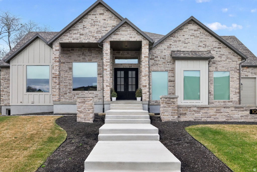 Come see this jaw dropping property at a group luxury home OPEN HOUSE Saturday, June 6th from 10:00-12:00!  Premium home in new upscale neighborhood with homes starting in the ~$2.5M range. Stunning views, magnificent home. 12-foot ceilings, 12' premium cabinetry, Wolf/Sub-Zero appliances, 8' doors, all designer premium finishes. Huge 3rd car w/RV&EV power. Prof. Landscaped w/flagstone fire pit rear, courtyard front. Basement finish in process. Fully framed with HVAC installed and ready to go - 2 additional bedrooms, 2 bathrooms, full laundry room, exercise/media room, and spacious basement kitchen. Sellers are motivated.