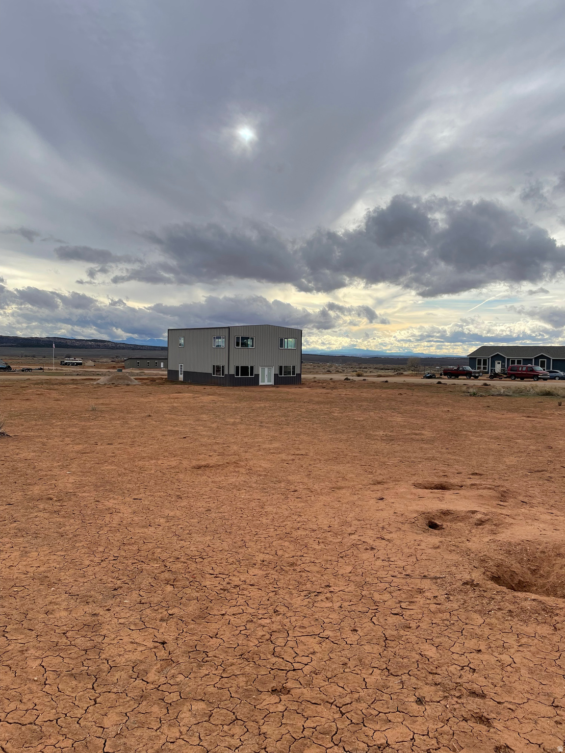 Located in La Sal, Utah this 1.12-acre property offers a great opportunity to own land with a 32' x 45' metal building with lot's of light. The spacious structure provides plenty of room to store your off-road vehicles, trailers, RV, or outdoor gear, making it an ideal basecamp for exploring the nearby red rock country.  The building is ready for use, with the potential to finish it out into a workshop, garage, barndominium, residence, or custom retreat depending on your needs. Whether you're looking for secure storage for your toys or a place to develop into a getaway near some of Utah's most iconic recreation areas, this property offers flexibility and future potential.  Enjoy the quiet surroundings of La Sal while still being conveniently close to Moab's world-class outdoor recreation, including off-roading, mountain biking, hiking, and nearby national parks. A great opportunity for adventurers, hobbyists, or anyone wanting a foothold near Moab.  Square footage figures are provided as a courtesy estimate only and were obtained from Records building plans.  Buyer is advised to obtain an independent measurement. No well or water right. Utilities not connected. Owner Agent.