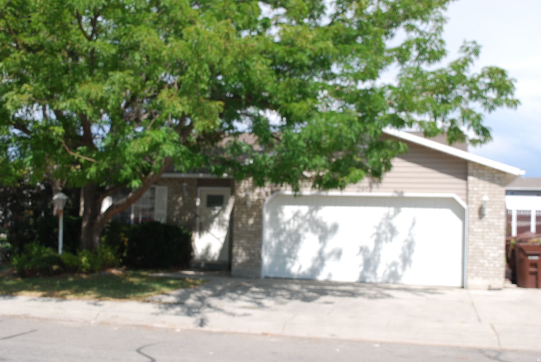 Beautiful rambler update and ready for you to move in!  New paint and flooring.  New roof.  Updated plumbing.  New range & dishwasher.  Microwave & garbage disposal less than a year old.  Corner lot with 2 double gate entries into yard, rv parking and 2 sheds.  Covered patio to enjoy shaded evenings.  Call today, before it is gone.