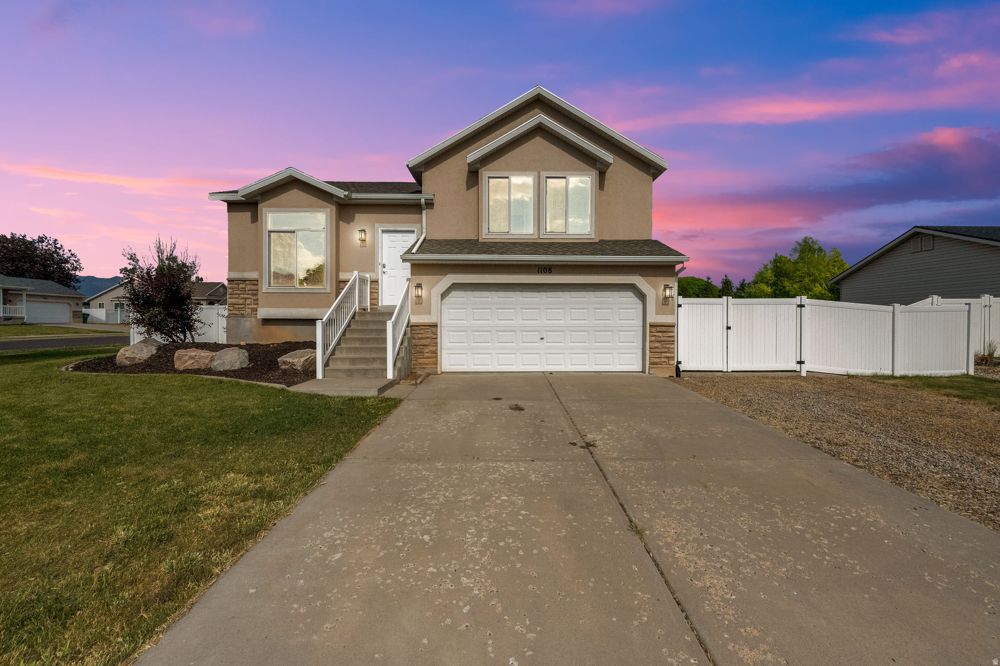 Beautifully remodeled 4-bedroom, 2-bathroom home situated on a spacious .24-acre corner lot with RV parking in a desirable Layton neighborhood. This move-in ready home features a 2-car garage and numerous major updates, including a new roof in 2023, HVAC system replaced in 2017, water heater installed in 2018, and a brand-new garage door opener. Inside, you'll find gorgeous new LVP flooring, fresh paint throughout, and brand-new carpet creating a clean, modern feel from top to bottom. The functional layout offers comfortable living spaces with plenty of room for family, entertaining, or working from home. With all the big-ticket items already updated, this home is truly turnkey and ready for its next owner. Conveniently located near schools, parks, shopping, and commuter access while offering the space and privacy of a large corner lot. Don't miss this incredible opportunity