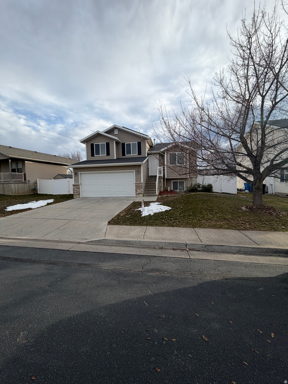 Ask About Seller-Paid Buydown Options.   Very well taken care of home in quiet and desirable North Logan Neighborhood! Walking distance to North Logan Library, schools and Hospital. 4 bedrooms, 3 full bathrooms and 2 car garage make this home the perfect size for your family. Walk into the warmth of a cozy living room. Kitchen offers plenty of cabinet space and a convenient kitchen island. Walk down into a spacious family room that opens to the back yard. The top floor offers 3 bedrooms and 2 full bathrooms. The Master bedroom a master Bathroom are located on this floor. Lower lever offers one more bedroom, a full bathroom and a separate, fully finished laundry room. Yard feels spacious and is surrounded by vinyl fencing. There is a cement patio, to enjoy outside dinners and a fire pit to finish your evening roasting Marsh-mellows. And lets not forget the gardening area and the community play ground right out the gate! Worried about the HOA fee? It not only includes the maintenance of the common areas, but also includes water, sewer and garbage collection! So that's less utilities that you pay. This home will not last long! Call Agent for same day showing!  Special financing available!