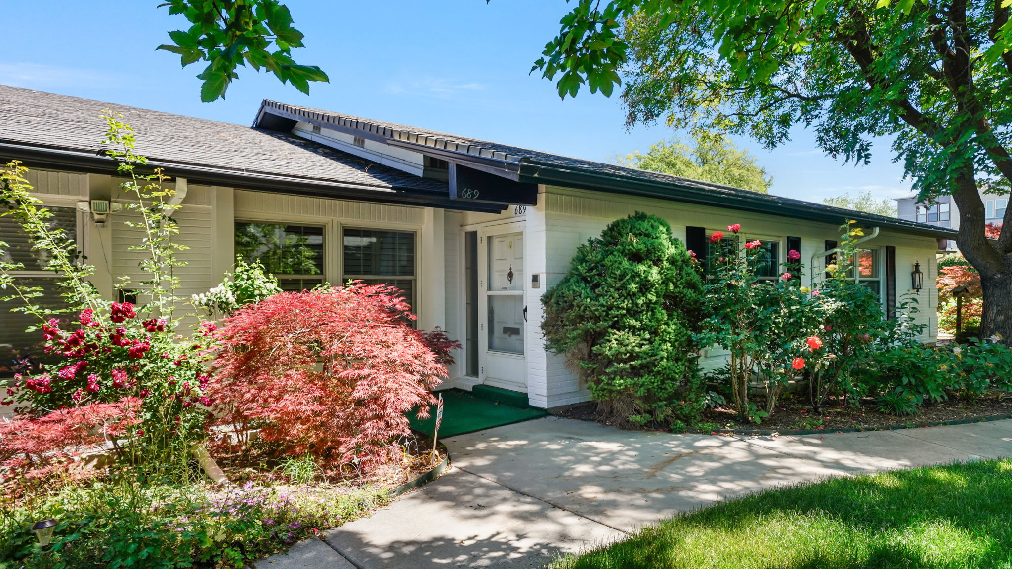 MOVE IN READY! Nestled within the highly sought-after Lexington Village at Old Farm, this spacious rambler-style residence offers a peaceful setting surrounded by beautifully landscaped grounds, scenic ponds, expansive green spaces, tennis and pickleball courts, an impressive indoor pool, clubhouses, and a fitness center. Main floor has NEW beige carpet and freshly painted walls. A thoughtfully designed floor plan features custom woodwork, abundant natural light, and a climate-controlled atrium terrace complete with heating, air conditioning, and sound. Generous living and dining areas provide excellent space for living and entertaining. The Galley kitchen showcases solid surface countertops, custom-crafted cabinetry, and ample storage. Main-floor laundry adds convenience. The primary suite offers a spa-inspired bath. A second main-floor room, complete with built-ins and a cozy fireplace, serves perfectly as a den, office, or additional bedroom. The finished lower level is perfect for entertaining, featuring a large Vintage recreation room with rich wood accents, decorative columns, Chanter Crystal lighting and a custom wet bar, plus a guest suite, cedar closet, and abundant storage. Additional highlights include an intercom system, security alarm, and a heated and cooled two-car garage with custom storage and a 220V outlet. HOA FEE COVERS MANY UTILITIES & AMENITIES! Buyer and buyers agent to verify all information
