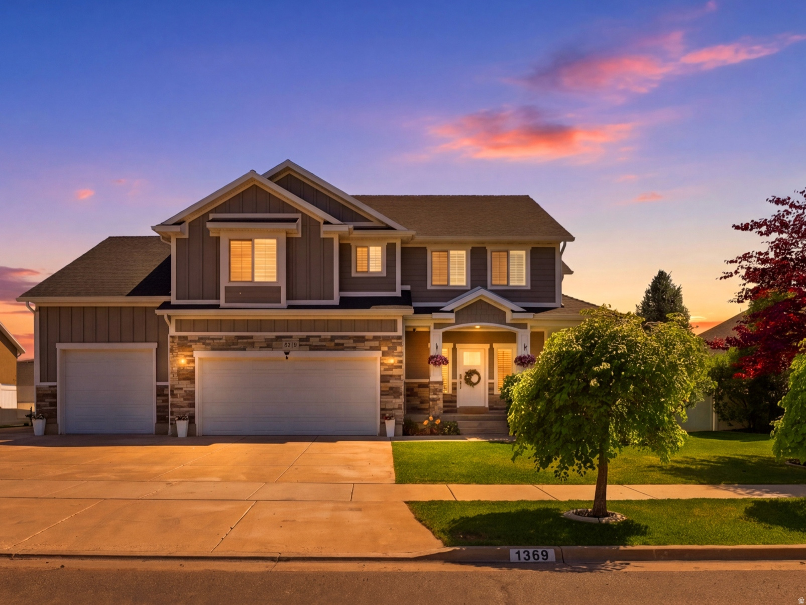 Beautiful north-facing, two-story home built in 2015 with 4,325 sq ft of thoughtfully designed living space on a .24-acre lot. This versatile home offers six bedrooms and 3.5 baths, plus a finished basement that includes a bedroom and full bath, a theater/family room, and a kid-friendly mini rock-climbing wall. The kitchen is a chef's dream with granite countertops, a spacious island, and abundant counter and cabinet space. Plantation shutters run throughout for timeless style and light control. The luxurious master suite features an extra bonus room that can be turned into a home office, workout space, or dressing area.  Additional highlights include an extra-wide, deep four-car garage, and a backyard perfectly suited for entertaining and play. Close to the new corridor and freeway, Layton Hospital, grocery stores, biking/walking trails, and a wide range of dining options. A rare blend of space, features, and location-perfect for growing families seeking comfort and convenience.
