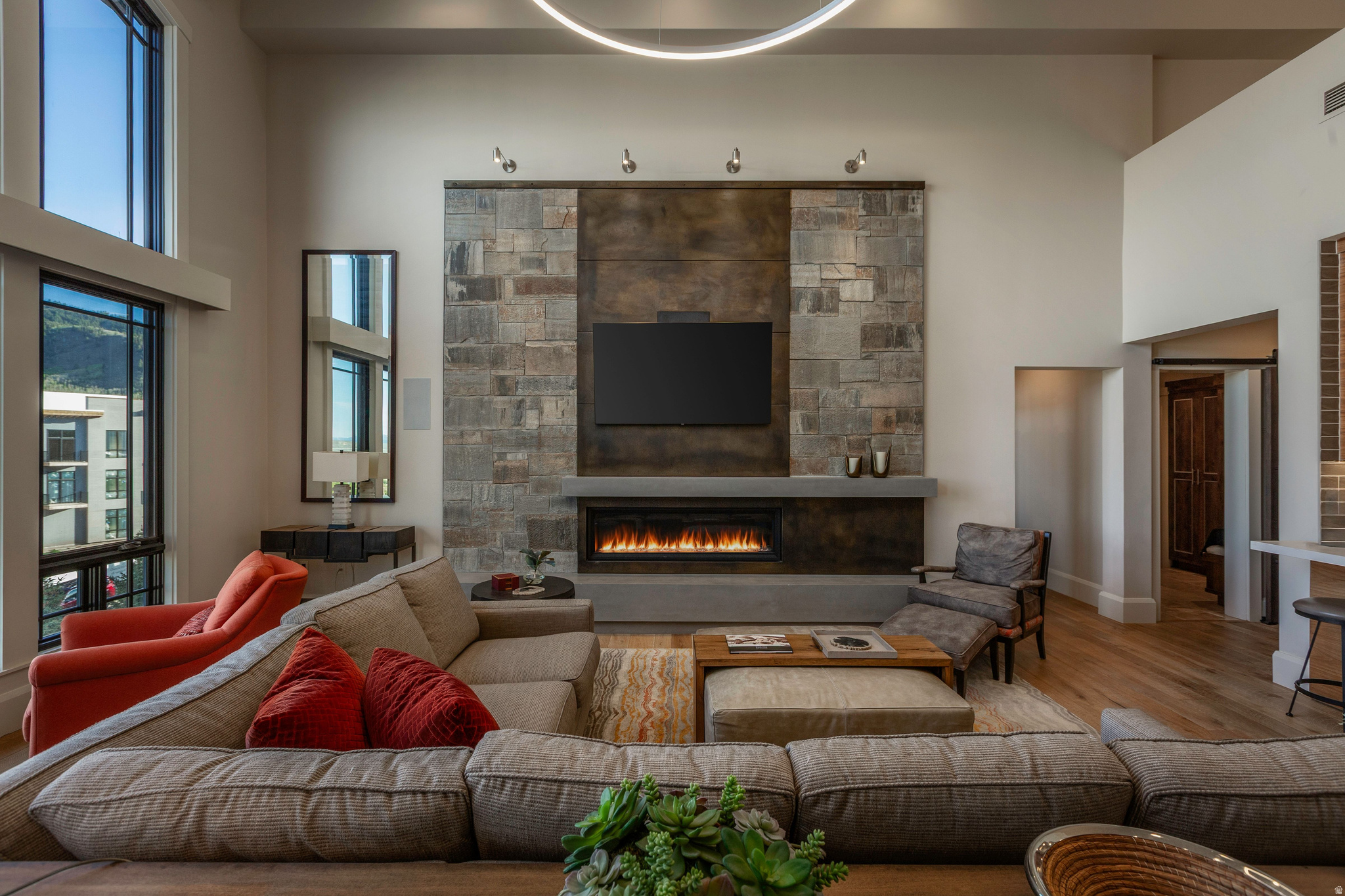 Nestled on the top floor and just steps from the Frostwood Gondola, this extensively renovated residence offers a rare opportunity to enjoy turnkey mountain living in the heart of Canyons Village. Following an approximately $800,000 renovation completed in December 2018, nearly every aspect of the home was thoughtfully reimagined, creating the most distinctive residences within the community. Dramatic double-height ceilings, expansive windows, and a contemporary fireplace anchor the light-filled great room, while the beautifully redesigned chef's kitchen features premium Wolf and Sub-Zero appliances, refined finishes, and an ideal layout for entertaining. The spacious primary suite is complemented by a fireplace and spa-inspired bathroom, while a custom-built bunk room and thoughtfully added third bedroom provide exceptional flexibility for hosting family and guests. Additional improvements include completely renovated bathrooms, new flooring throughout, custom cabinetry, and a dedicated HVAC system providing individualized climate control within the residence. Offered fully furnished, the home is ready to be enjoyed immediately. Beyond the residence itself, enjoy effortless access to the four-season lifestyle that defines Park City. Skiing begins just across the street at the Frostwood Gondola, while hiking, mountain biking, golf, dining, concerts, and the vibrant energy of Canyons Village are all moments away. Owners enjoy access to premier amenities, including concierge services, a full-service spa, fitness center, year-round heated pool and hot tub, ski valet, shuttle service, and more. Combining a top-floor location, extensive renovation, direct gondola access, and a rare three-bedroom layout, this residence offers an exceptional opportunity to experience mountain living at its finest.