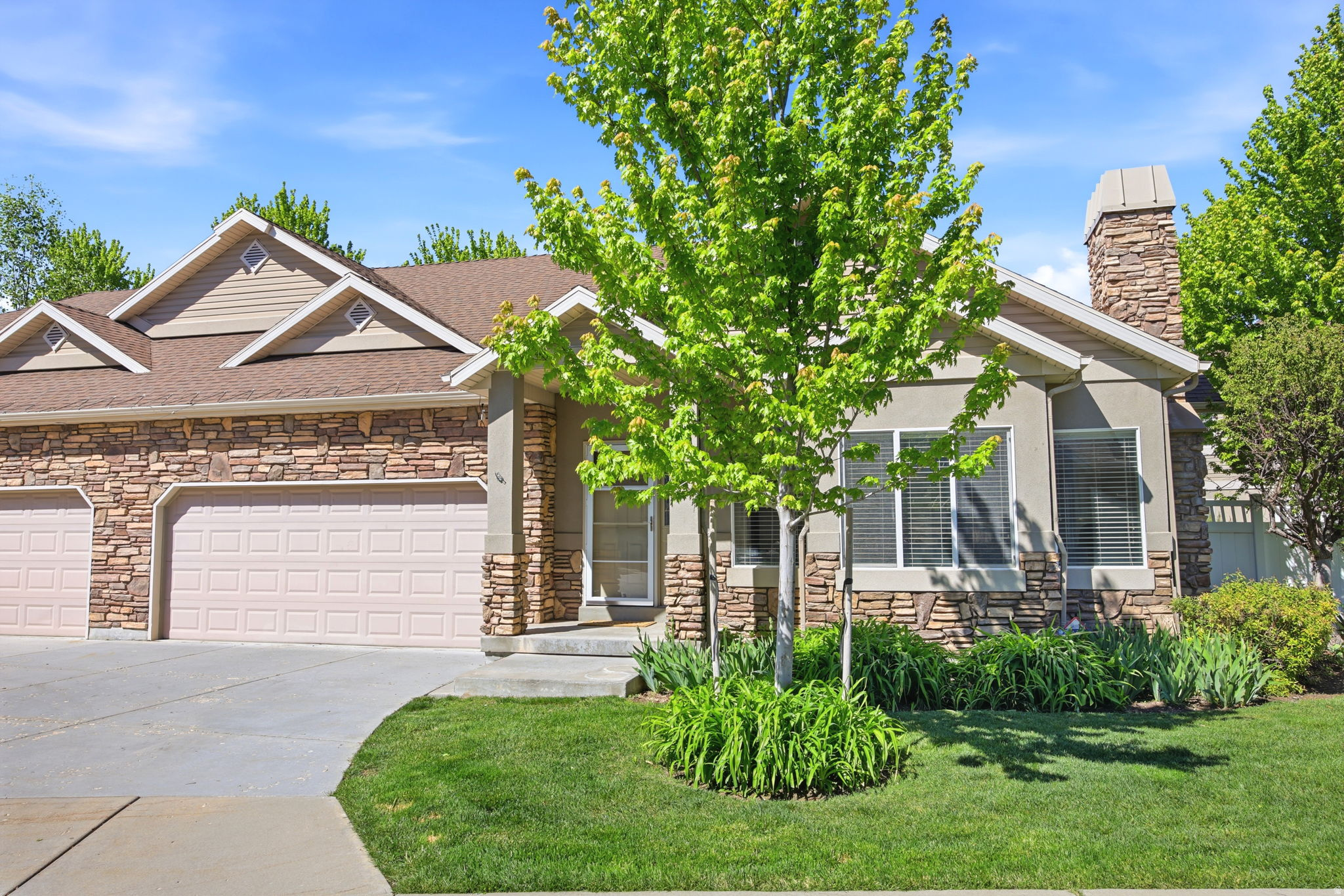 Welcome to Clearwater Cove, a hidden gem tucked along the border of Layton and Kaysville where quiet streets, beautifully maintained grounds, and peaceful community trails create an easy, low-maintenance lifestyle. This beautifully designed end-row townhouse offers the rare combination of privacy, accessibility, and true main-level living. Thoughtfully designed with wheelchair accessibility in mind, the spacious layout features an open concept living area and a versatile den just off the kitchen, perfect for a home office or additional flex space. Natural light fills the home thanks to the desirable end-unit location, while the two-car garage offers additional storage and includes a carpeted wheelchair ramp. Conveniently located just off Main Street with quick access to I-15, this is a rare opportunity to enjoy comfortable, accessible living in one of the area's most peaceful communities. Schedule your private showing today!