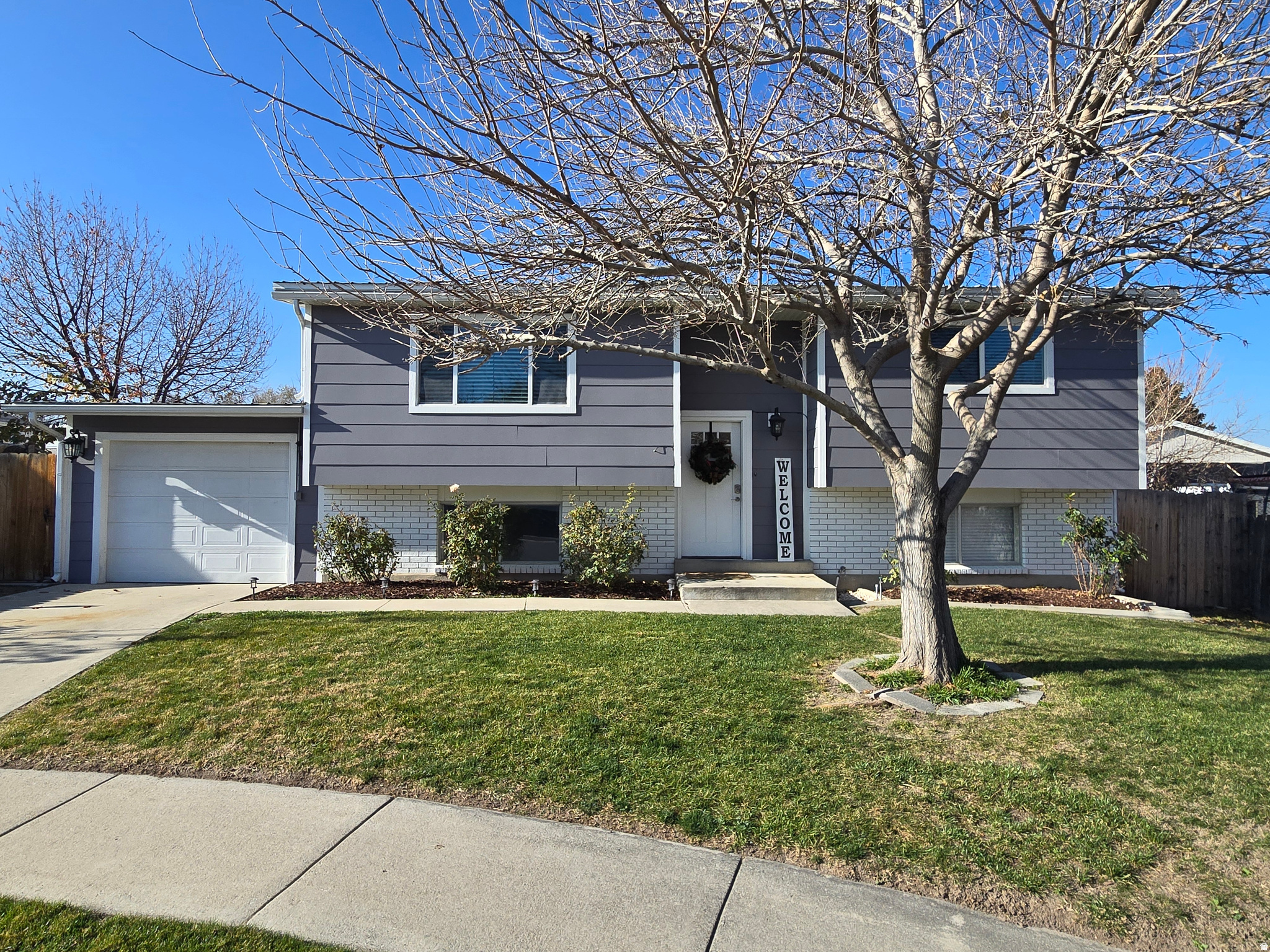 Charming, Updated Home with a large fenced private backyard in a Quiet Neighborhood. This cozy home features numerous updates completed in 2021. The remodel included a beautiful new kitchen with Pergo flooring, fresh carpet throughout most of the home, and updated bathrooms. Most windows were replaced, and a new condenser unit was installed to provide efficient air conditioning. along with a new water heater. The extra room downstairs could easily be a 5th bedroom just needs carpet. 2 large family rooms make for great entertaining. The exterior received new cement board siding, fresh paint, and updated outdoor lighting for great curb appeal. Inside, the upstairs family room, hallway, and kitchen and downstairs have just been freshly painted, creating a bright and welcoming atmosphere-perfect for entertaining. The refrigerator is included. Square footage figures are provided from Salt Lake County records; buyers are advised to verify all information.