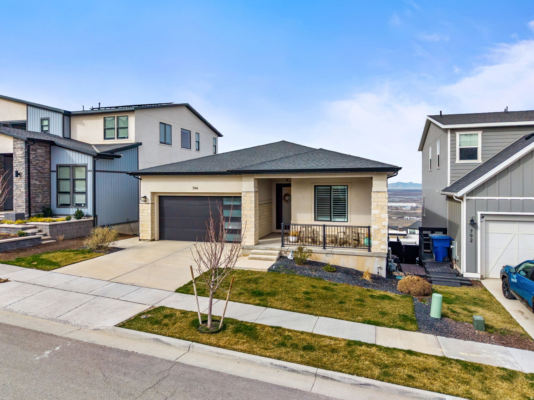 **ATTRACTIVE Price Adjustment; You have to see this home!!** Sitting on the east bench of North Salt Lake, this rambler features stunning views, views, views! Two large deck systems, oversized swim spa (included), firepit, and massive vinyl sliders create the perfect atmosphere to relax or entertain friends and guests with ease! As you walk in, you will immediately notice the gorgeous solid surface flooring the runs throughout the home. Plantation shutters adorn the windows. Automatic sun shades along the backside of the home. Tall ceilings with abundant can lights and other stunning light fixtures. There are two kitchens in this home. The main level kitchen features lovely quartz countertops, floor to ceiling cabinets (with lighting) stainless steel appliances (gas range), and eye catching pendants. The main level primary ensuite has its own amazing views, access to the deck, dual sink vanity, large walk-in closet (professionally built out/organized), and fantastic walk in shower. This home works great for that single person or a couple of professionals. Bedroom 2 (main level) has been built out as an office/study/den and provides an amazing place to work from home. Bedroom 3 (main level) doubles as a guest room with it's own murphy bed, and also had built in cabinetry for that craft room/secondary office. As you make your way downstairs, this gem of a home just keeps giving. Open concept layout, with a tastefully designed entertaining wet bar, a over sized workout/gym (could easily be turned back into a massive bedroom), and spacious family room, and is graced by a slider that opens out to a breathtaking view, yet still maintaining a surprising amount of privacy. Don't forget the spa style walkin shower and tub ensuite where luxury is just the beginning. There is zoned AC/Heating in the basement that is efficient and works really well. Even the garage has custom built-ins and floor coatings. This is one of those homes that has had so much money poured into it to create a quality and highend finished delight. You have to walk it and see it to understand the quality you get for the money here. Shows REALLy well. It won't disappoint! All furniture/TVs can be negotiated to be included at the right terms.