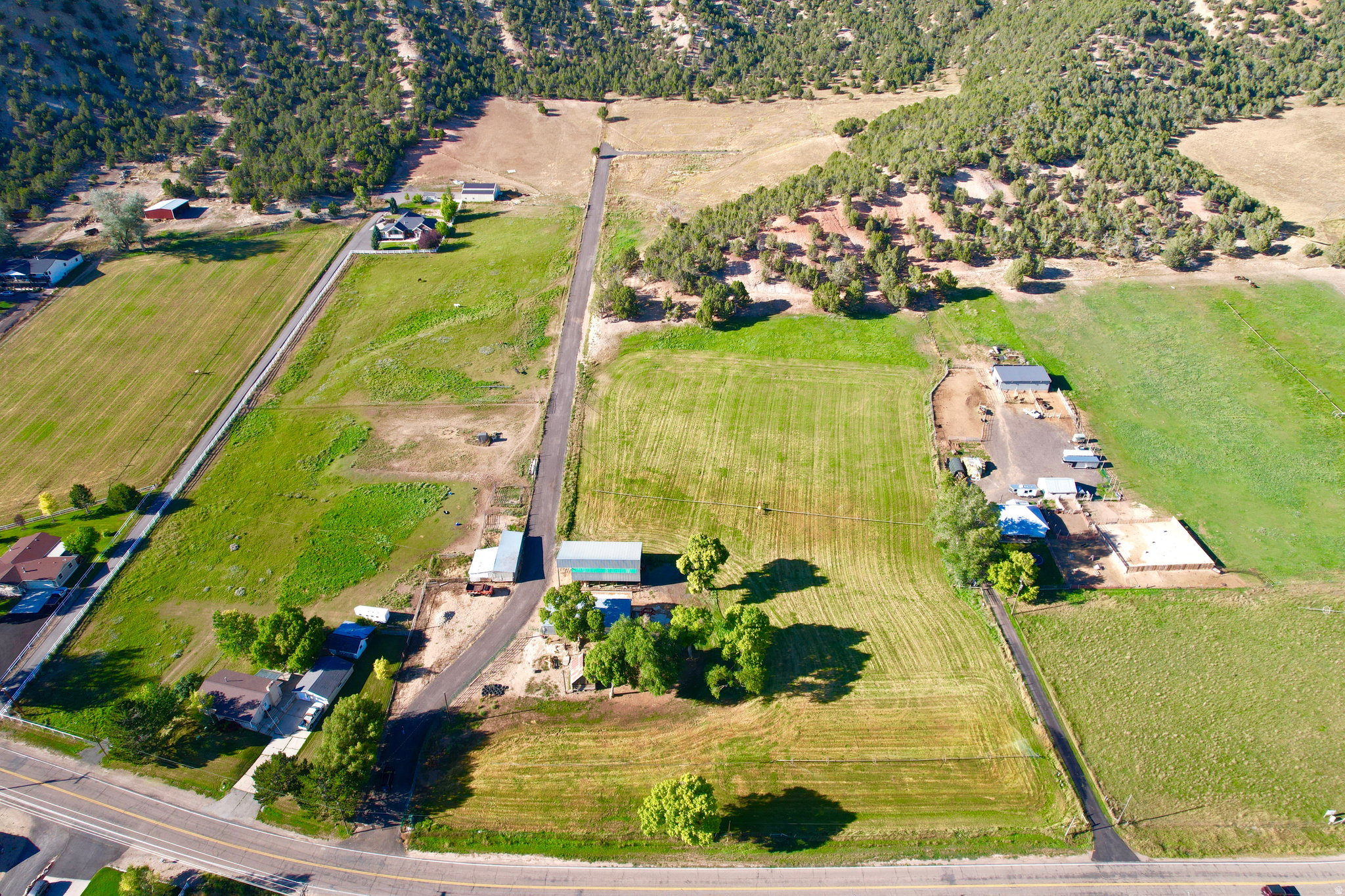 Your Dream lot has hit the market. NO HOA plenty of space and water shares for livestock, farming or to build your dream home. Existing barns are included for farming or recreational use. Both Culinary and Secondary water shares on the property which is hard to come by. Gas and power also on the property the only thing left is to establish a home site & for septic system to be installed.  The property has some of the best views in Summit County. Looking around to see the majestic Coalville ledges, Lewis Peak and parts of Park City. Come get the first chance to own this little piece of heaven and begin your next adventure.