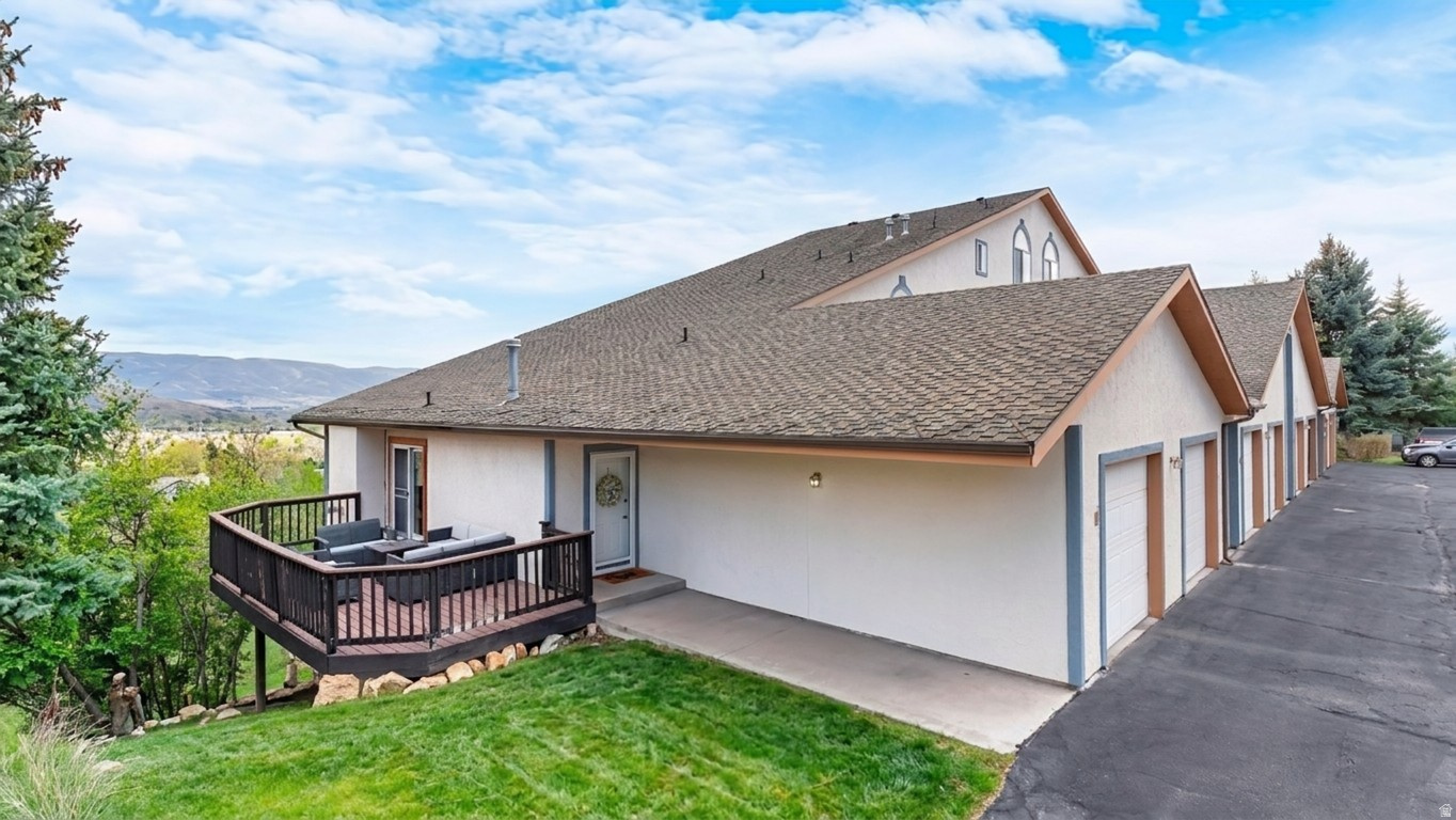 Located up scenic Lime Canyon Road, this one-of-a-kind townhome is the only unit of its kind in Swiss Oaks. Ideally positioned at the end of a quiet cul-de-sac, it offers exceptional privacy along with the convenience of a garage that provides direct access into the home. This unique property features a rare, oversized side deck-exclusive to this unit-surrounded by mature trees and overlooking the 9th hole of The Homestead Golf Course. The view is protected by deed-restricted open space, ensuring it will never be obstructed. In addition to the deck, you can take in the scenery from two additional private balconies. Inside, the home has been thoughtfully updated with new flooring and fresh paint, vaulted ceilings on the main level, and a newly remodeled primary bathroom with a walk-in shower. Major systems have also been addressed, including a newer furnace and HVAC (within the last 7 years). The attached one-car garage offers built-in storage for added convenience. Enjoy a peaceful, private retreat just one minute from Zermatt and Homestead Resorts. The HOA provides exceptional value, covering homeowners insurance and snow removal, and grants access to outstanding amenities including a whirlpool spa, clubhouse, indoor sports court, game room, and basketball, tennis, and pickleball courts. If you've been considering Midway for a primary residence or second home, this is an opportunity you won't want to miss. For more information about the area-including nearby hiking and mountain biking trails, golf, and local amenities-please reach out to the listing agent, a Midway resident of over 20 years. Please note: nightly rentals are not permitted; long-term rentals are allowed. See agent remarks for details. Square footage is sourced from the appraisal.