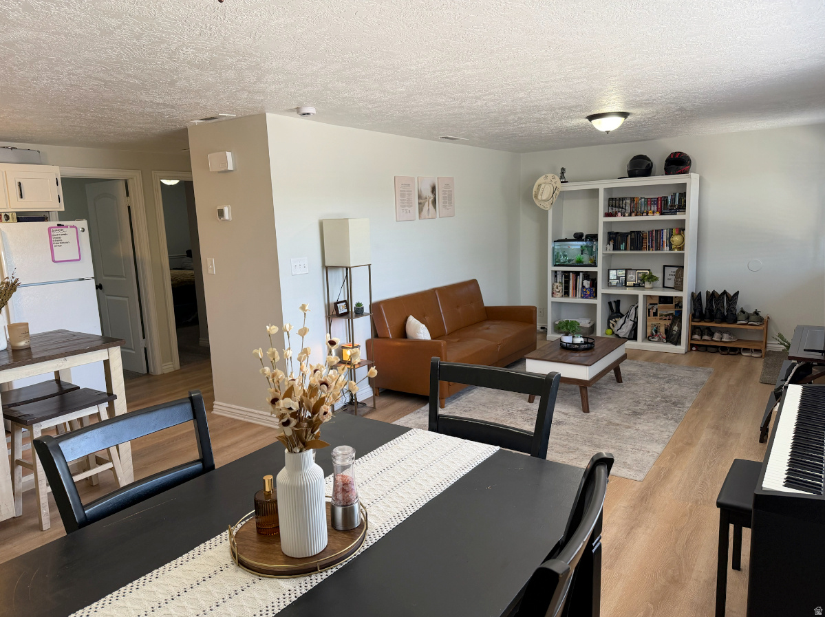 Updated 2-bed, 1-bath condo offers step-free, single-level living near the Green Springs Golf Course in Washington. This home features an open & bright living space with modern wood-laminate flooring, white shaker-style kitchen cabinets, and a stylish white subway tile backsplash with a newer stainless steel stove, dishwasher, and thermostat. Refrigerator, microwave, and washer/dryer are also included. The heat pump/AC is from 2014 & water heater is from 2016. One dedicated covered carport space plus an additional guest/second parking directly in front of the unit. Great location, near shopping, restaurants, theaters, golfing, hiking, biking, and more. Owner/Agent