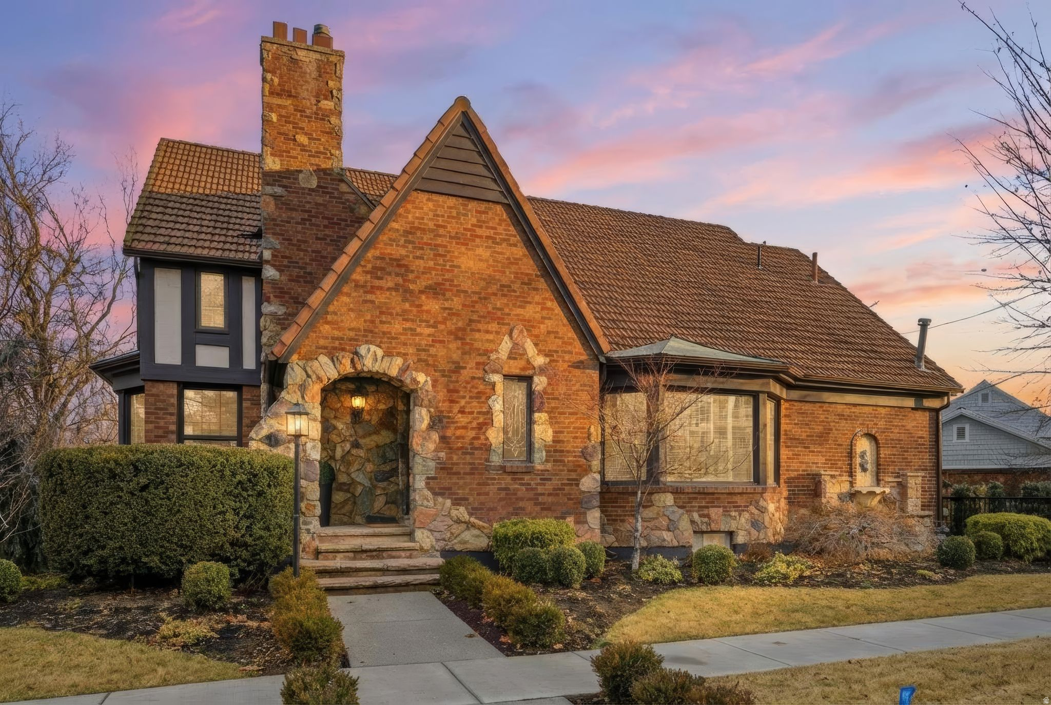 Historic Federal Heights Tudor with flexible living near the University of Utah, hospitals, downtown Salt Lake City, and the Avenues. This 5-bed, 5-bath, 4,072 sq ft residence blends 1937 character with fresh carpet, fresh paint, and an adaptable layout. The main home offers 4 bedrooms and 4 baths, plus an optional independent 1-bed/1-bath apartment with separate entrance that can remain separate or reconnect to the home. Classic charm, refreshed finishes, and a rare location-flexibility combination under $1.7M.