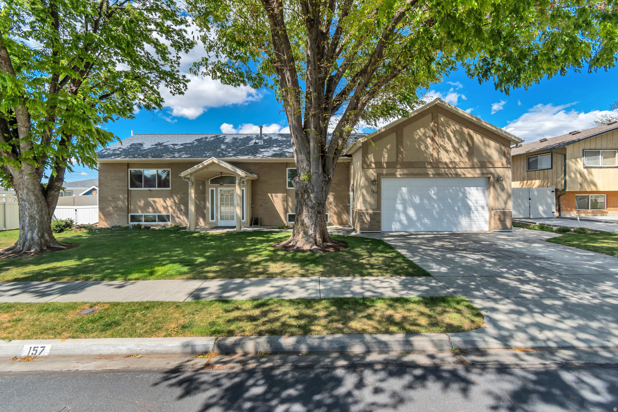 This large, beautiful split rambler is in a very desirable location in the always-desirable city of Provo, offering a prime address with easy access to schools, parks, shopping, dining, and commuter routes, plus a large workshop with garage door access that's ideal for hobbyists, DIY projects, or extra storage, and flexible space that could be tailored to meet your specific workshop needs, with room to add the perfect finishes and updates you prefer to design your dream home-surfaces and bones ready for personalization and the opportunity to create a home that fits your style, vision, and budget.