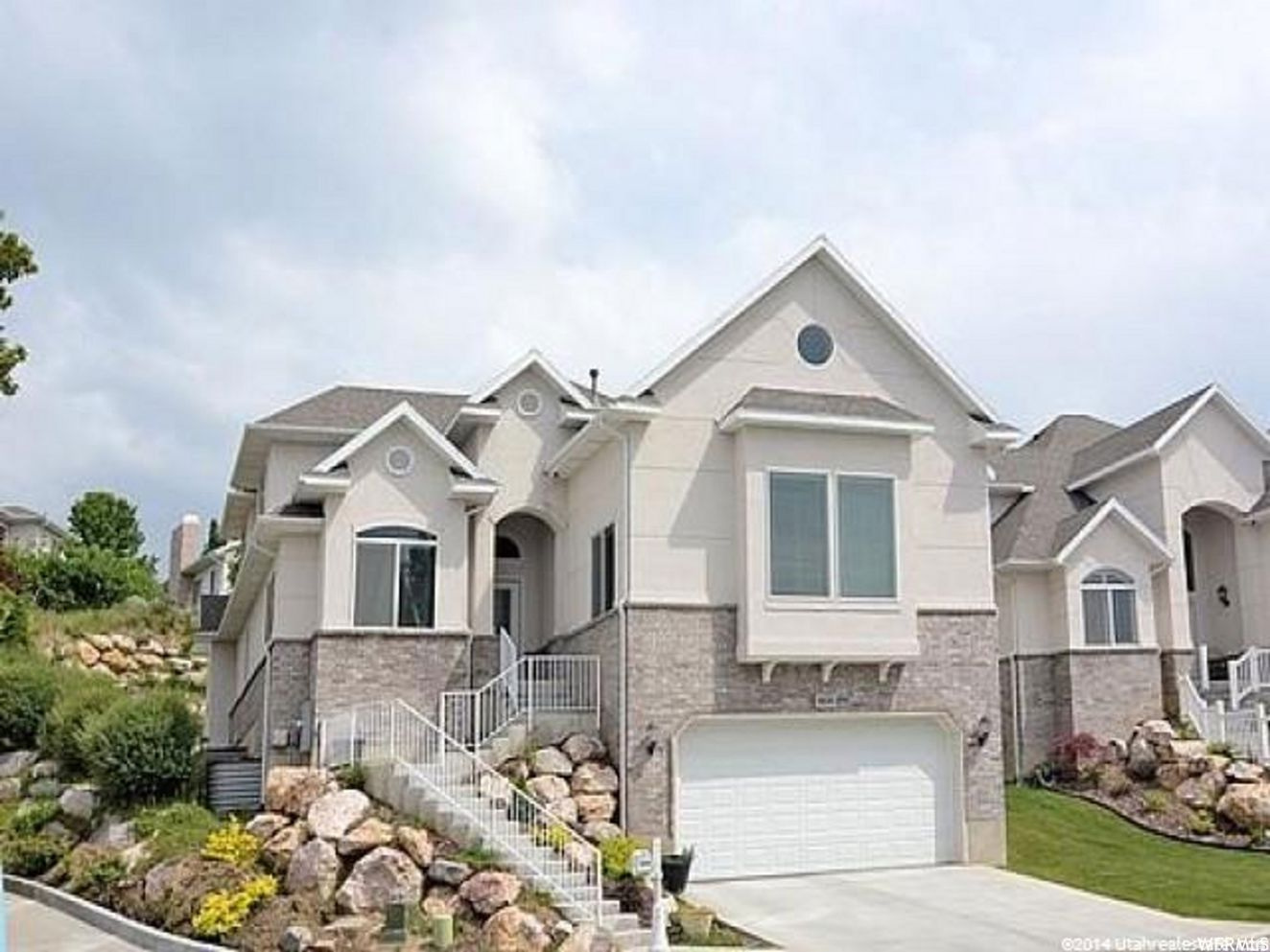 GORGEOUS HOME ON BOUNTIFUL EAST BENCH AT THE END OF A CUL-DE-SAC IN BARTON WOODS!  This house has amazing views of the valley, lake and Mountains to the Northeast in Bountiful. The floor plan in unbelievable, high cathedral ceilings custom kitchen cabinets, upgraded appliances and fixtures with Granite Countertops. Open to alarge Great Room with a gas fireplace and amazing valley view. Private office and fantastic Primary bedroom and bath.  Huge laundry/mud room and large bedrooms. Basement features recreation room/theater room (projector system included!) can be used for dance studio or exercise room. Beautiful upgrades throughout entire home! Secluded and maintained yard! A must see gem on The Bench! Don't miss it. (garage entry is on street level) Agt Remarks:AGENTS!! Entry from garage is lower level, master shows main,  Small backyard, all maintained. Buyer to verify all information  HOA Remarks:HOA provides yard care including mowing, edging, fertilizer Square footage figures are provided as a courtesy estimate only and were obtained from County.  Buyer is advised to obtain an independent measurement.