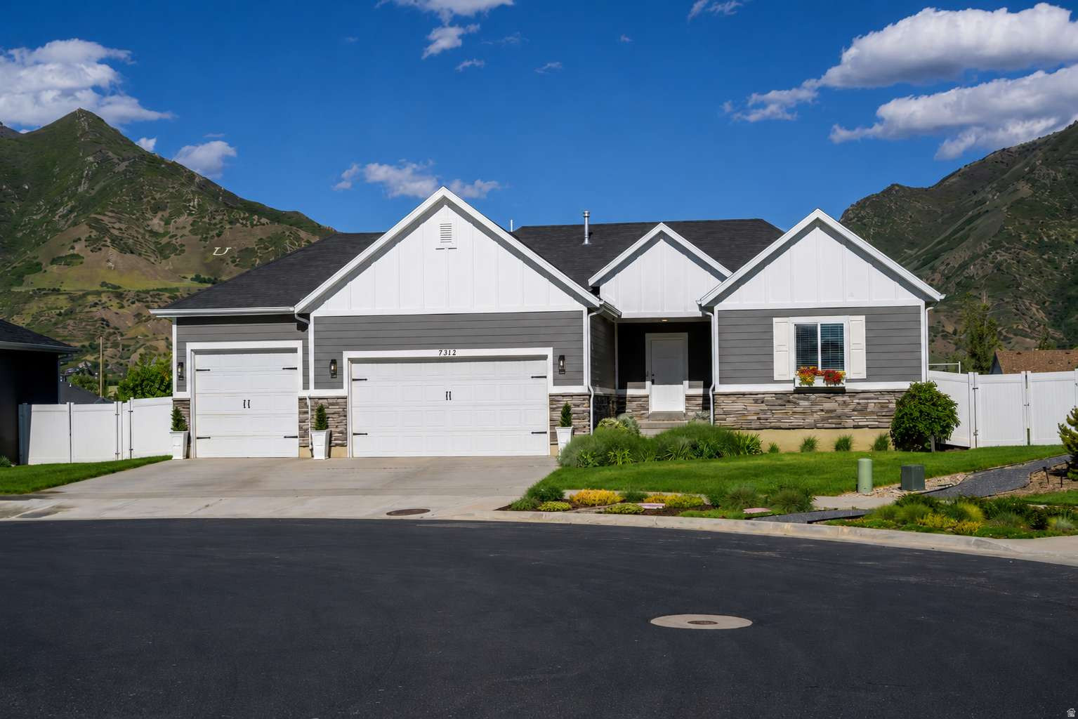 Beautiful South Weber home located in a quiet dead-end cul-de-sac with stunning mountain views, abundant natural light, and exceptional curb appeal. This clean, vacant, move-in ready home features vaulted ceilings, upgraded LED lighting, spacious open living areas, and a welcoming neighborhood atmosphere with nearby parks, walking paths, and outdoor recreation. The kitchen offers quartz countertops, soft-close cabinetry and drawers, large walk-in pantry, double sink, and generous gathering space with tall ceilings and large windows. Spacious primary suite includes vaulted ceilings, oversized tub and shower, double sinks, abundant drawer storage, and large walk-in closet.  Fully finished basement with new carpet, dimmable lighting, built-in shelving, cold storage, and large storage room. Oversized extra-wide 3-car garage with epoxy floors, extra-deep bay, 240V outlet, and 12-foot ceilings.