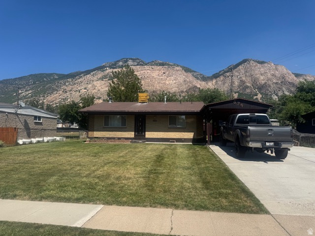 Nestled on a quiet street in the desirable Ron Claire subdivision, this charming ranch-style home offers the ease and convenience of single-level living. The open floor plan creates a comfortable, functional space with plenty of potential to make it your own.  Step outside to a fully fenced backyard featuring a storage shed and breathtaking views of Ben Lomond Peak, providing the perfect backdrop for relaxing, gardening, or entertaining.  Whether you're looking for your next home, a renovation project, or an investment opportunity, this property offers endless possibilities in a peaceful, established neighborhood.  The seller has never occupied the property and is selling it strictly as-is. No seller property disclosures will be provided. Square footage figures are provided as a courtesy estimate only. Buyer is advised to obtain an independent