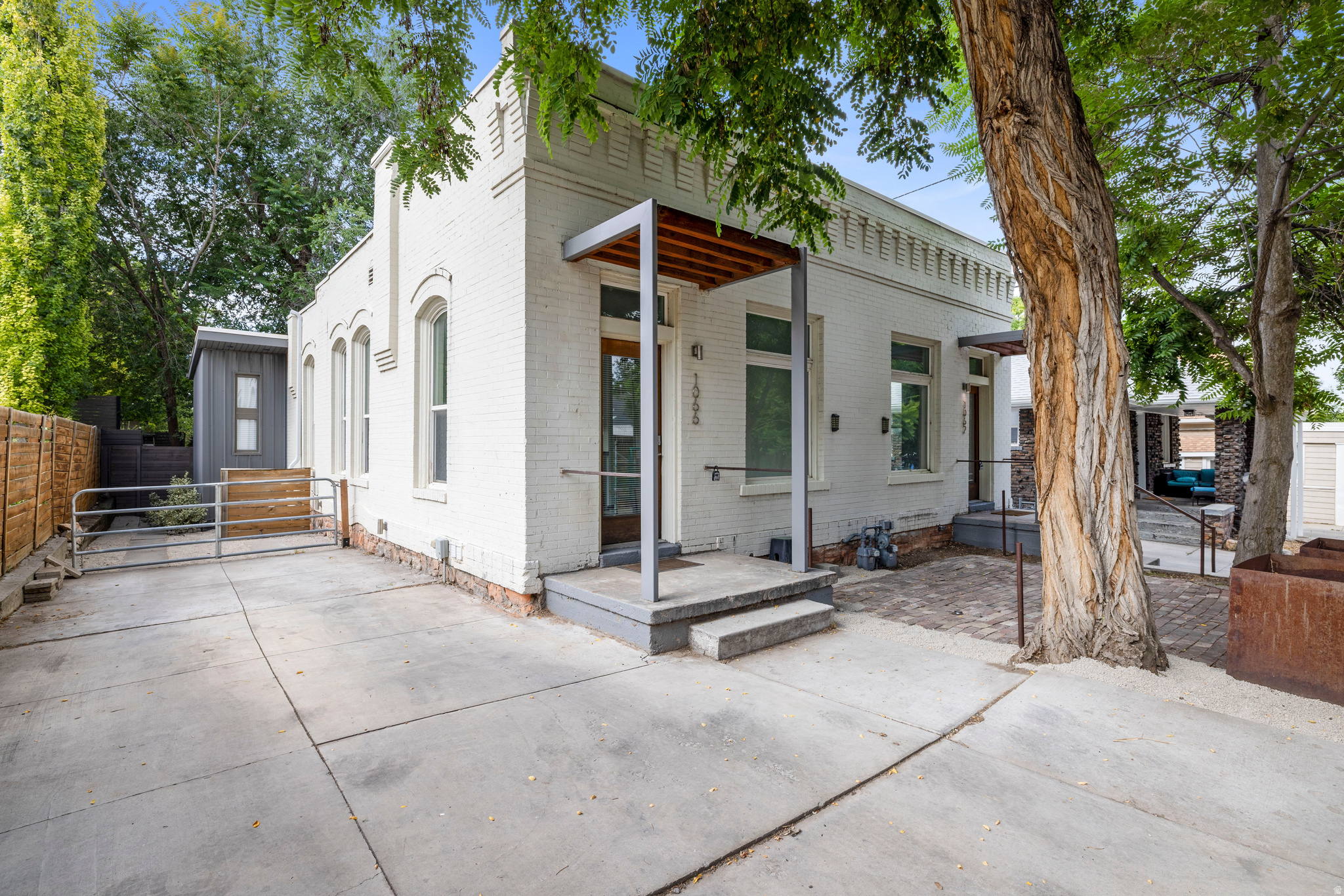 Excellent investment opportunity just three blocks from the University of Utah! This side-by-side duplex was extensively remodeled in 2019 with major updates including plumbing, electrical, kitchens, bathrooms, windows, HVAC, and more. Both units have been freshly painted, and the east unit features brand-new carpet, making it move-in ready for a new tenant or owner-occupant.  The west unit is leased on a new 12-month lease at $3,190 per month, providing immediate, stable income. The east unit is available for primary residency and offers approximately 150 additional square feet, a private fenced yard, off-street parking, and strong rental potential with projected rents exceeding the west unit. Whether you're looking to expand your investment portfolio or live in one unit while generating rental income from the other, this turnkey property is a rare opportunity in a highly desirable location close to campus, downtown, hospitals, and public transportation.