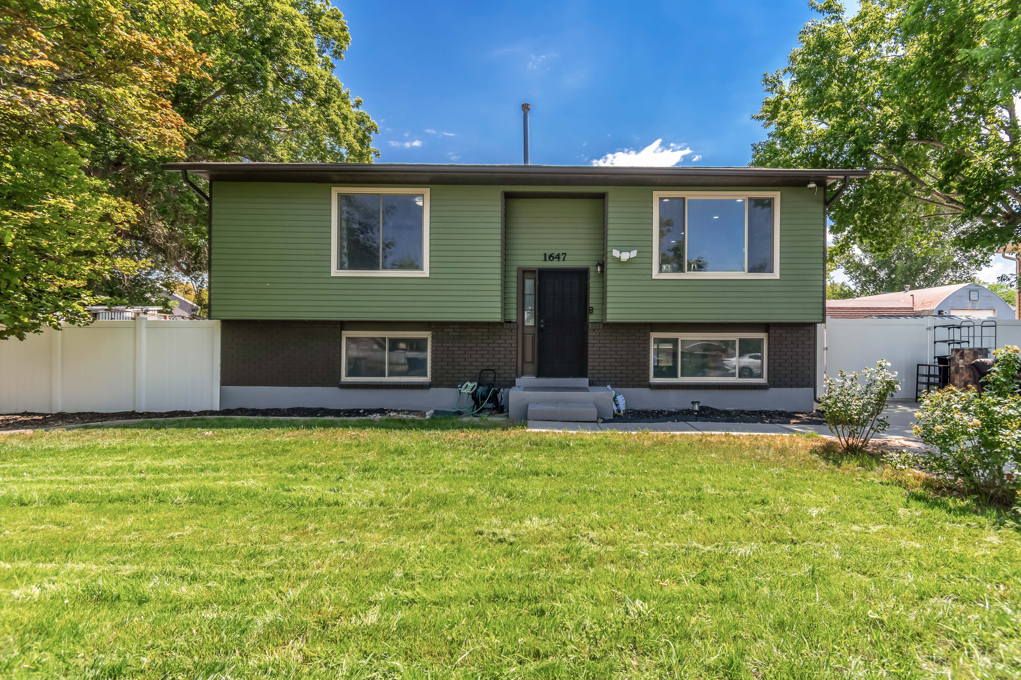 ***NO SHOWINGS UNTIL GRAND OPEN HOUSE SATURDAY, JULY 18TH 11AM-1PM*** Well-maintained and ideally located, this West Jordan home offers exceptional convenience just minutes from Redwood Road, I-15, and Bangerter Highway. The updated kitchen features stylish shaker-style cabinetry, recessed lighting, and stainless steel appliances, creating a modern and functional space for everyday living. Step outside to enjoy the extended deck, perfect for relaxing or entertaining. The fully fenced backyard includes two storage sheds-one equipped with electricity, ideal for a workshop, hobby space, or additional storage, and a second oversized shed providing even more room for your tools and equipment. Additional upgrades include exterior paint completed within the last two years and paid-off solar panels, helping improve energy efficiency. The included playground set makes the backyard ready for outdoor fun, while ample RV parking provides plenty of space for your recreational vehicles, trailers, or extra parking. Combining modern updates, abundant storage, and an unbeatable location, this home is one you won't want to miss. Buyer to verify all.