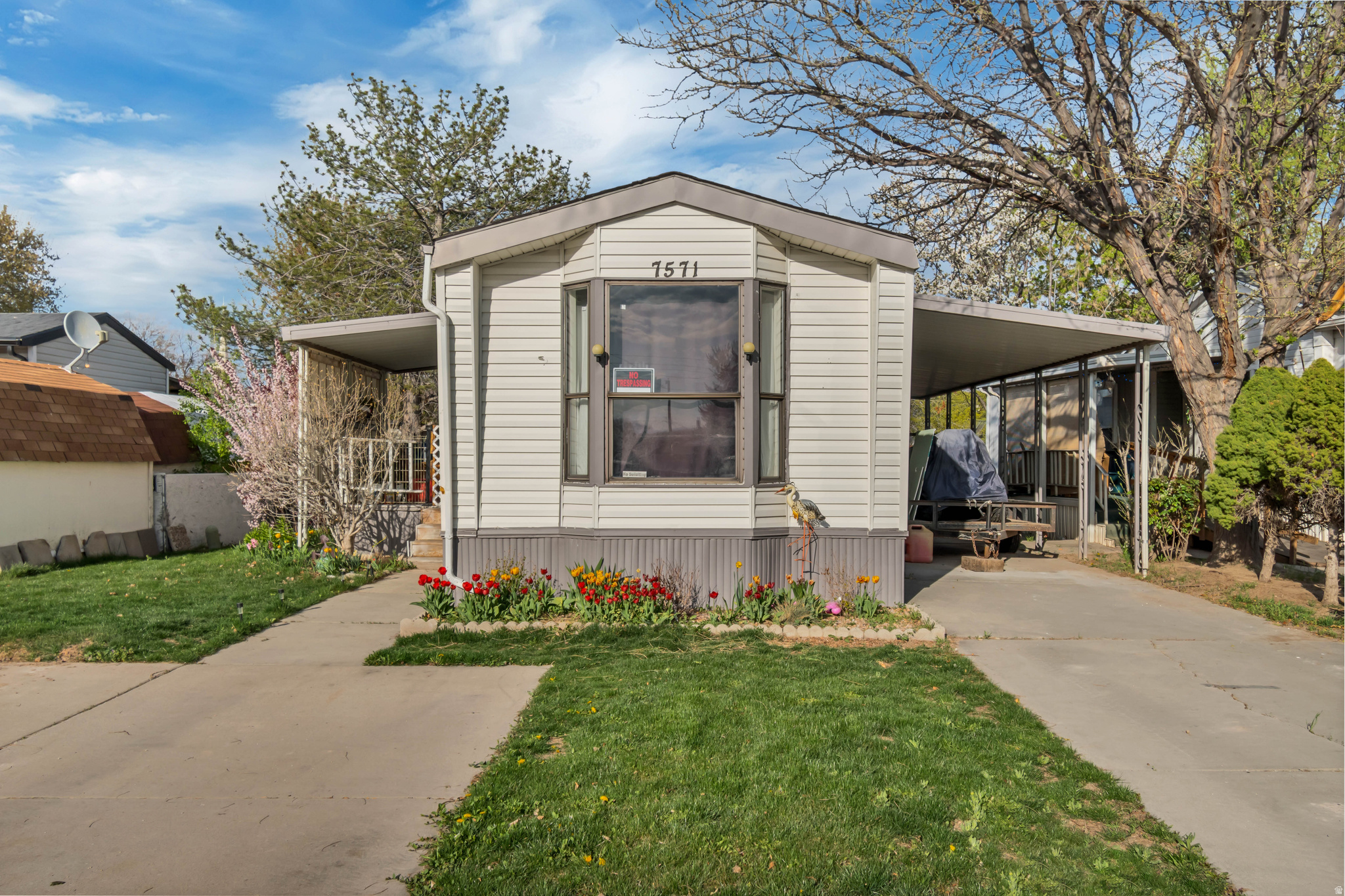 You'll love this beautifully updated home in a prime, convenient location near schools, shopping and freeway access.  Inside enjoy stylish upgrades including quartz countertops, shaker style cabinets, and newer stainless steel appliances - all included. The home features new flooring  throughout, fresh paint inside & out, new modern fixtures and vanities. The furnace & water heater are less than 3 yrs old, offering a piece of mind.  Step outside to a spacious, fully fenced yard ideal for entertaining, gardening, or letting kids and pets play freely. Ample parking is available for you and your guest.  All residents must be approved by the Whisperwood Park Manager. THREE MONTHS LOT RENT PAID BY SELLER WITH ACCEPTED OFFER