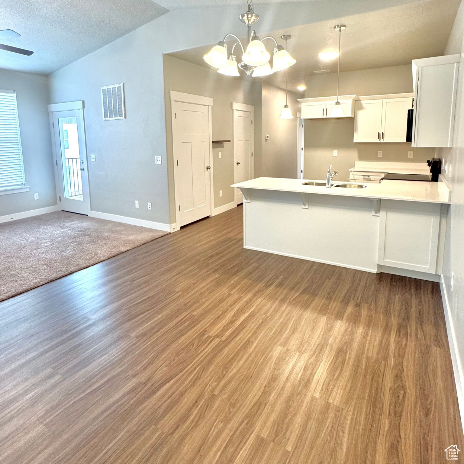 Short Sale- Priced to sell!   Beautiful nearly new 3-bedroom condo in Saratoga Springs! Built in 2024, this top-floor unit offers modern finishes, an open-concept layout, and plenty of natural light throughout. The kitchen features sleek cabinetry, quartz countertops, and stainless-steel appliances. Enjoy 3 spacious bedrooms, 2 full bathrooms, and private balcony views from the 3rd story. Conveniently located near shopping, schools, and Utah Lake. Short sale-subject to 3rd-party approval.