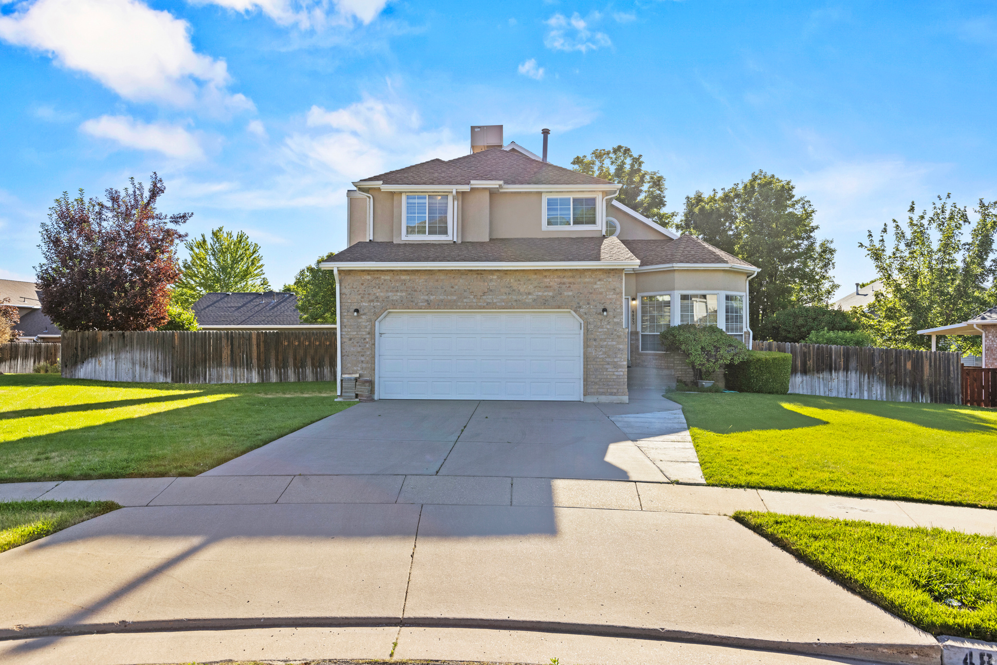 Welcome to this spacious 6-bedroom, 3.5-bath home nestled in a quiet South Ogden cul-de-sac! Featuring a newer furnace, central A/C, water heater, and a fully finished basement. Enjoy summer BBQs on the backyard deck, relax in the vaulted primary suite with a private bath, and take advantage of all appliances included. Conveniently located near shopping, dining, Weber State University, and Hwy 89. Square footage figures are provided as a courtesy estimate only and were obtained from county records. Buyer is advised to obtain an independent measurement