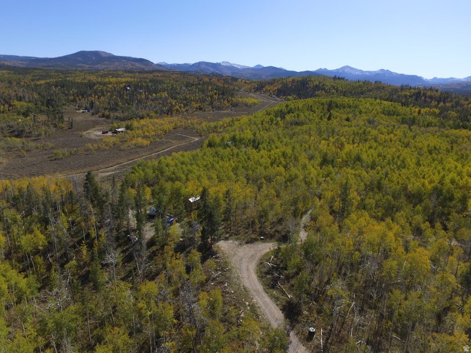 This Uinta Mountains property is the perfect place to setup the mountain getaway of your dreams. Whether you?re looking for a place to build a cabin or just wat a camping spot to call your own, this lot is prepped for you to start enjoying immediately. Improvements are already in place including: a large gravel pad, 1,000-gallon septic system, two electrical hookups, each equipped with standard 120V outlets and 30-amp RV service, a frost-free faucet connected to the Uinta Lands Association water system, a sturdy shed, and firepit area.  This property is tucked near the back of a quiet dead-end road in the Uinta Lands gated community and offers mountain top  views, a community fishing pond, community shooting range, and a quick access into the National Forest.