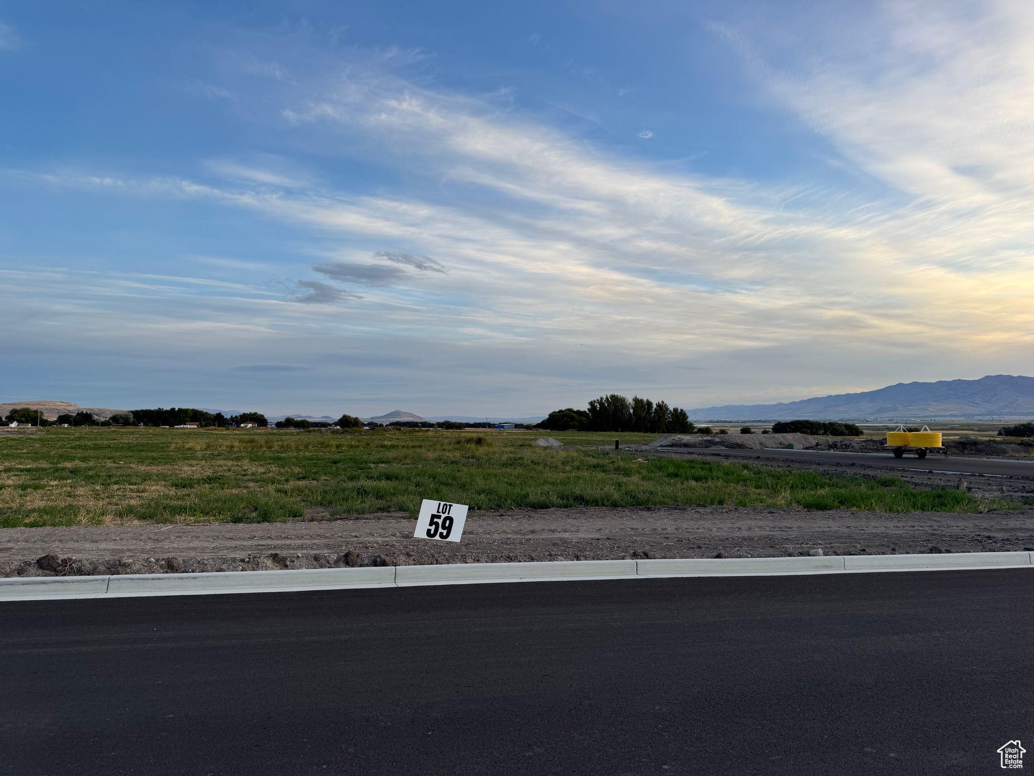 Bring your own Builder! Multiple lots available - Build your dream home in the peaceful and scenic community of Mendon. Blueberry Springs offers spacious 5/8+acre lots with breathtaking views of the mountains and valley. Enjoy paved public roads and full utility access, including Mendon City water, data, power, and secondary water stubbed to each lot. Irrigation water is managed and maintained by the Blueberry Springs HOA. Buyers are responsible for choosing and installing a septic system, subject to approval by Cache County. Each lot includes curb, gutter, and sidewalk frontage. This subdivision allows animal rights in accordance with Mendon City ordinances (https://mendoncityutah.gov). Bring your own builder and design your ideal home while adhering to city setbacks and protective covenants that maintain the neighborhood's appeal.