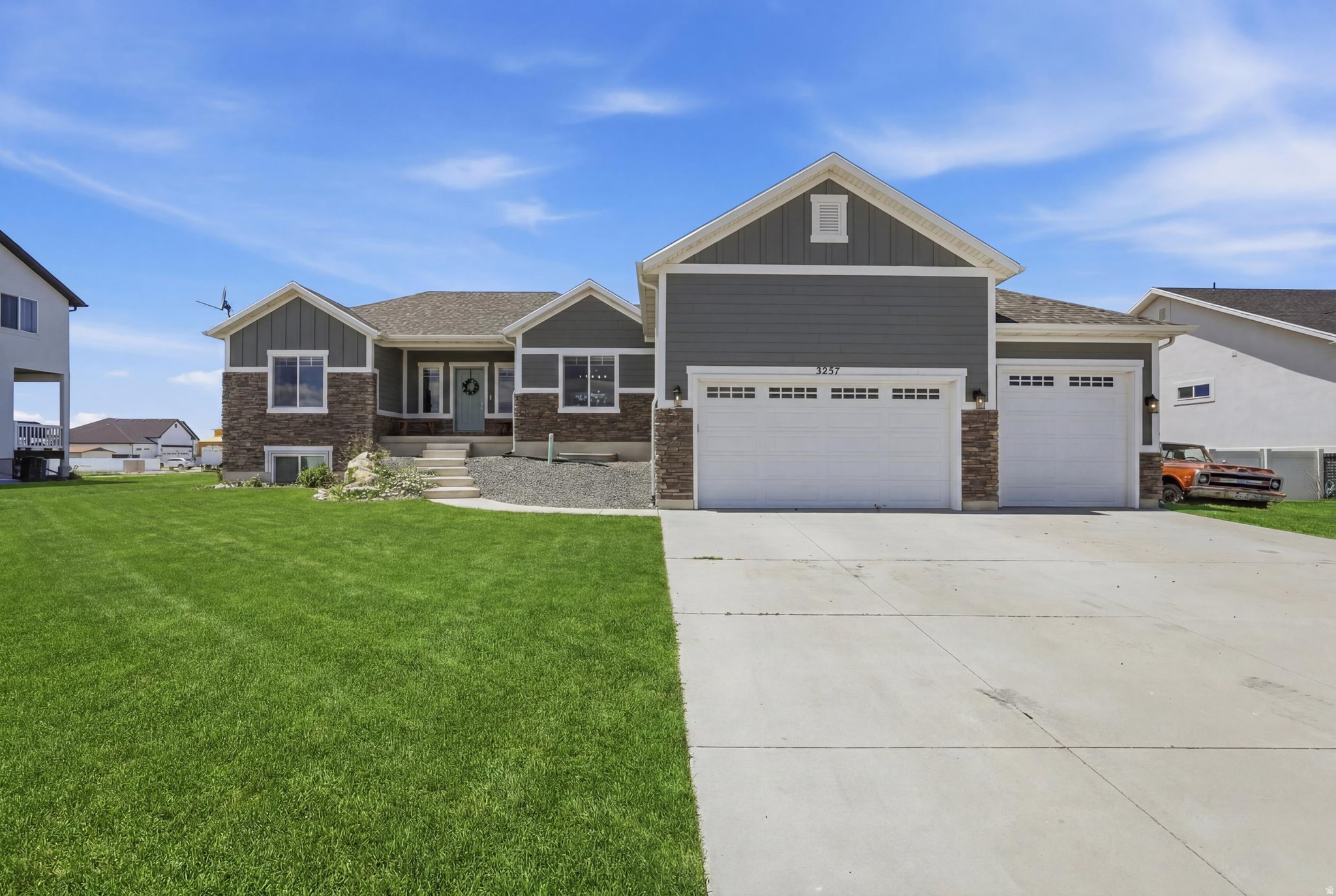 Welcome to this beautifully maintained rambler situated on a spacious -acre lot in a desirable neighborhood near West Field High School. This home offers curb appeal with modern finishes, stone accents, and an oversized 3-car garage?perfect for vehicles, toys, a workshop, or additional storage.  Inside, you'll find a bright, open-concept floor plan that's ideal for both everyday living and entertaining. The spacious living areas are filled with natural light, creating a warm and inviting atmosphere.  One of the home's greatest features is the unfinished basement, offering a blank canvas to design and personalize the space to fit your needs. Whether you're dreaming of additional bedrooms, a home theater, gym, game room, or an income-producing accessory apartment (subject to local regulations), the possibilities are endless.  Outside, enjoy the expansive backyard with plenty of room for outdoor entertaining, gardening, RV parking, or simply relaxing in your own private space