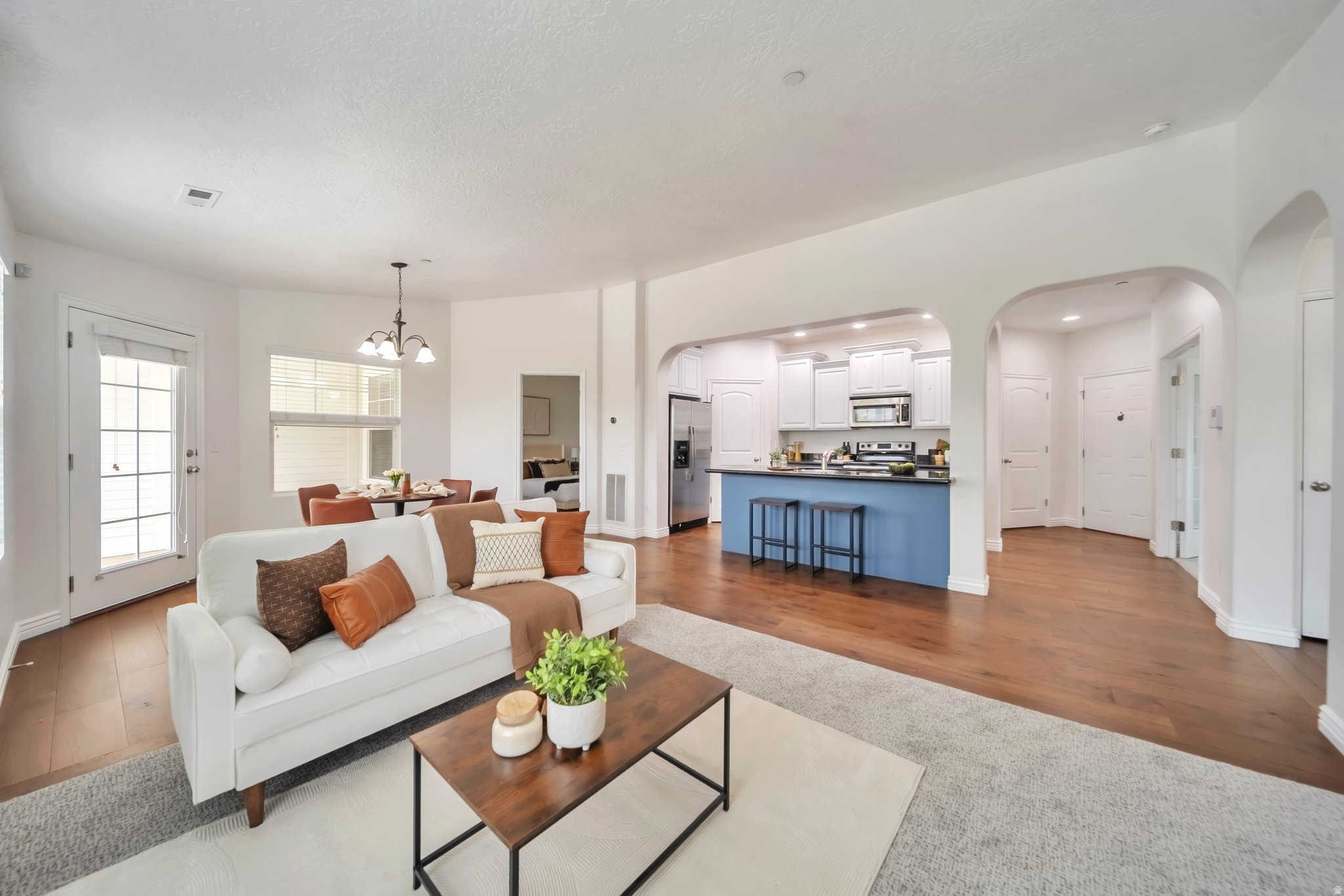 **PRICE DROPPED so grab it! Luxury touches that stand out!  Find yourself at home in this 3 bdr 2 bath TOP floor condo with complete elite remodel--new high-end carpet, new paint and updated cabinetry! Experience the difference with no cut corners. Get dazzled with the vaults, quiet top floor, pampering balcony views, stainless appliances, gorgeous fireplace, granite, walk-in closets, and beautiful design finishes. Separate laundry/utility room. Ultra clean and meticulously cared for! Embrace Daybreak with access to pools, splashpads, trails and parks, paddleboarding and fishing at the lake, basketball, tennis, and pickleball courts, live concerts , playgrounds and community events. Spoil yourself with neighborhood dining, shopping, and baseball at the new Salt Lake Bees stadium!  Set up your private tour today!