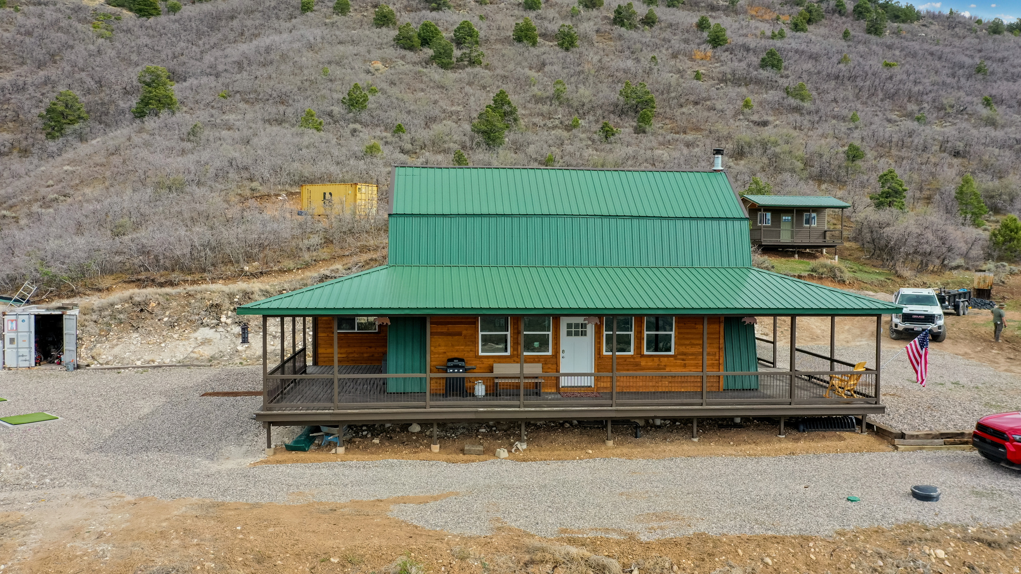 Escape to your own private mountain sanctuary with this fully furnished, off-grid cabin with incredible views, just 35 minutes from Spanish Fork. Located in Hideaway Valley. Set on 18.57 acres and no one will be build higher because it is backed by association land, this rare property offers unmatched seclusion and year-round accessibility. The  main cabin features single-level living, wrap around deck, complemented by a spacious loft that sleeps up to eight which could be divided to make 2 additional bedrooms. A charming guest cabin ensures comfortable hosting for family and friends. Designed for independence, the property includes solar power with batteries, a 1,000-gallon gravity-fed water system, propane, and private septic. Experience outdoor living at its finest with private trails, a zip line, 3 golf pads, and clay shooting range. Additional features include 20-foot white storage container and two ready-to-build pads-one with power installed.  4WD/AWD ACCESS ONLY, you will need a vehicle with 4WD to reach the cabin.