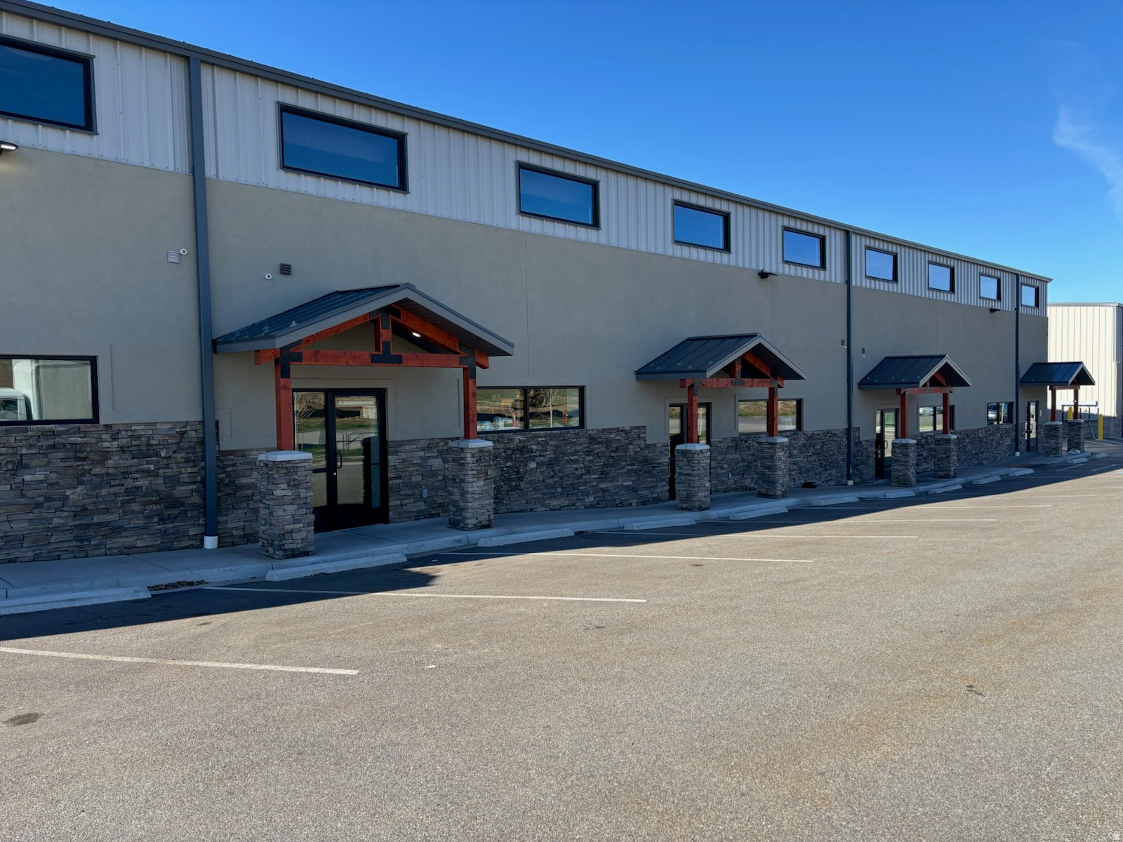 Large industrial warehouse and distribution space available in Layton with flexible lease options from approximately 2,000 SF to 20,000 SF. Ideal for warehousing, logistics, distribution, e-commerce fulfillment, freight handling, inventory storage, suppliers, and industrial users. The property features freight/semi-dock access, multiple 14-foot overhead roll-up doors, tall ceilings, large open warehouse areas, office space, restrooms, and 3-phase power. Excellent truck and trailer access with ample parking and loading areas, including approximately 25 parking stalls. Conveniently located near I-15, Highway 89, and Hill Air Force Base, providing outstanding access to major transportation routes throughout Northern Utah. Contact the listing agent for pricing, availability, and tour information.