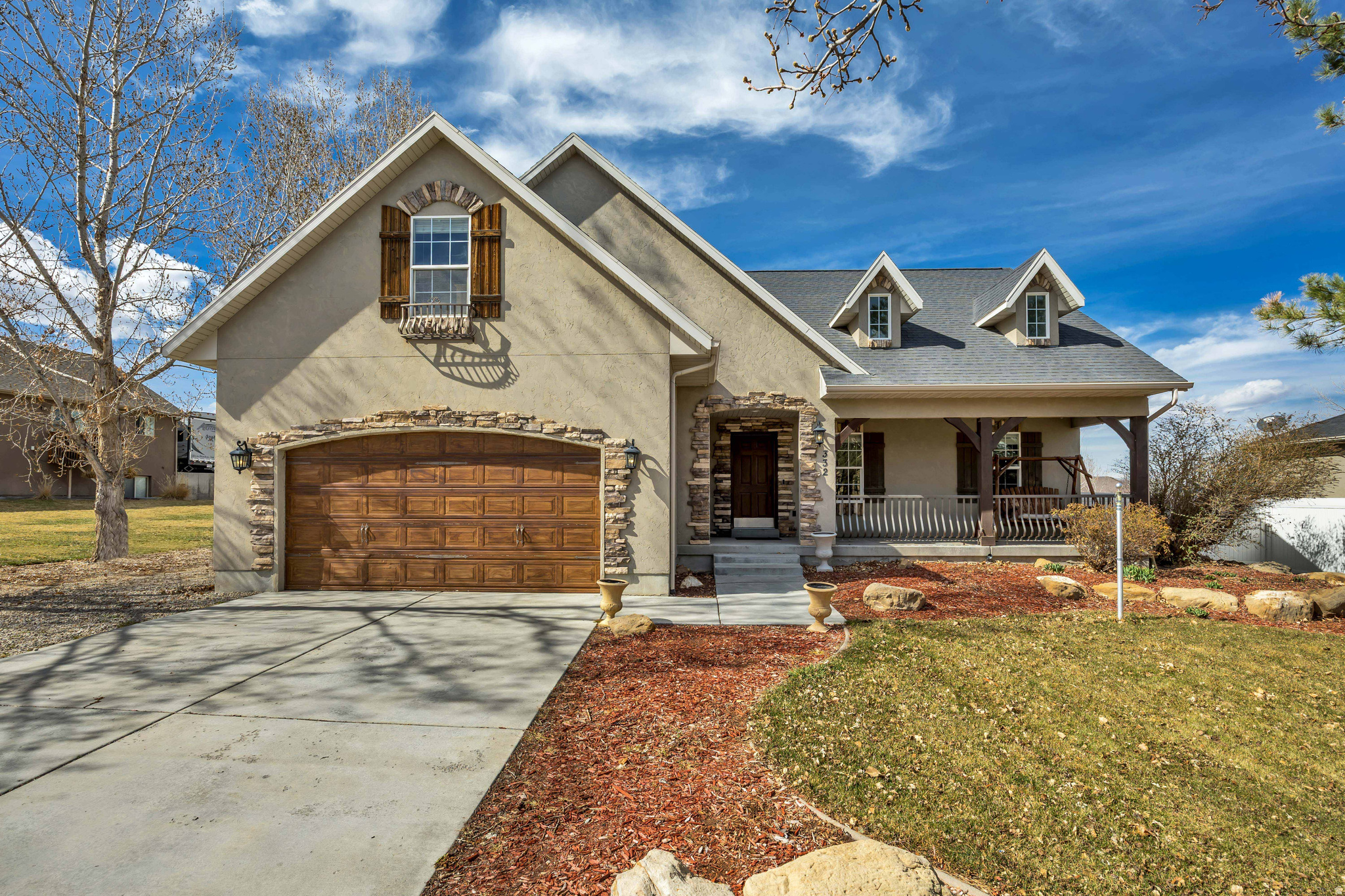 Beautiful two-story home with a walk-out basement in the Saratoga Hills development, located right next to a community park with great amenities, including a playground.  This spacious home features 7 bedrooms and 4 bathrooms, offering plenty of room for everyone. It includes numerous upgrades and updates, two laundry rooms, and a nearly finished second kitchen with potential for an ADU.  The basement also features a home theater with stadium seating and a projection system, perfect for movie nights and entertaining.  Situated on a large 0.25-acre lot, the home boasts a gorgeous oversized front porch, ideal for relaxing and enjoying stunning sunsets.  The location is superb, and the home has an incredibly charming feel throughout.  This one won't last long!