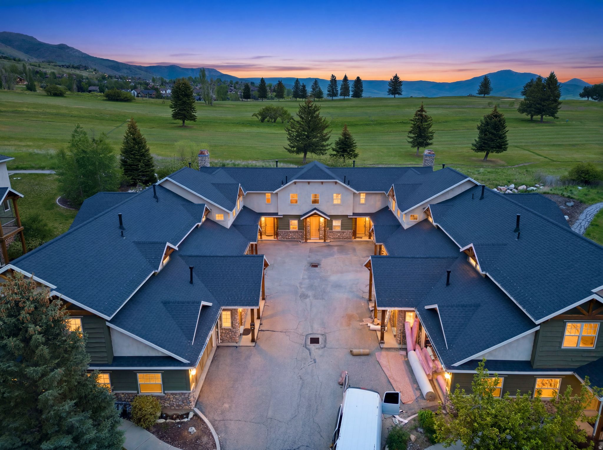 Mountain Golf & Ski Paradise in Eden, Utah! Imagine waking up in this fully furnished 2-story townhome, stepping onto the fairways of Wolf Creek Golf Course right out your back door, with sweeping mountain views framing every window. Just minutes from Powder Mountain Ski Resort, this is your all-season adventure hub-golf, ski, mountain bike, hike, or boat to your heart's content. Inside, warm wood cabinetry, a gourmet kitchen with island, soaring stone fireplaces, and bright, spacious living areas deliver cozy luxury with that perfect mountain vibe. High ceilings and oversized windows pull in epic Wasatch Range views from dawn to dusk. Enjoy resort-style living with zero hassle: the HOA handles all landscaping and snow removal. The community clubhouse seals the deal-pool, hot tub, sauna, gym, fire pit, BBQ, biking trails, and paid cable TV. Perfect as a primary residence, vacation escape, or high-income short-term rental investment. Year-round recreation, maintenance-free luxury, and endless mountain magic! Please remove shoes and turn off lights after showing. Thank you!
