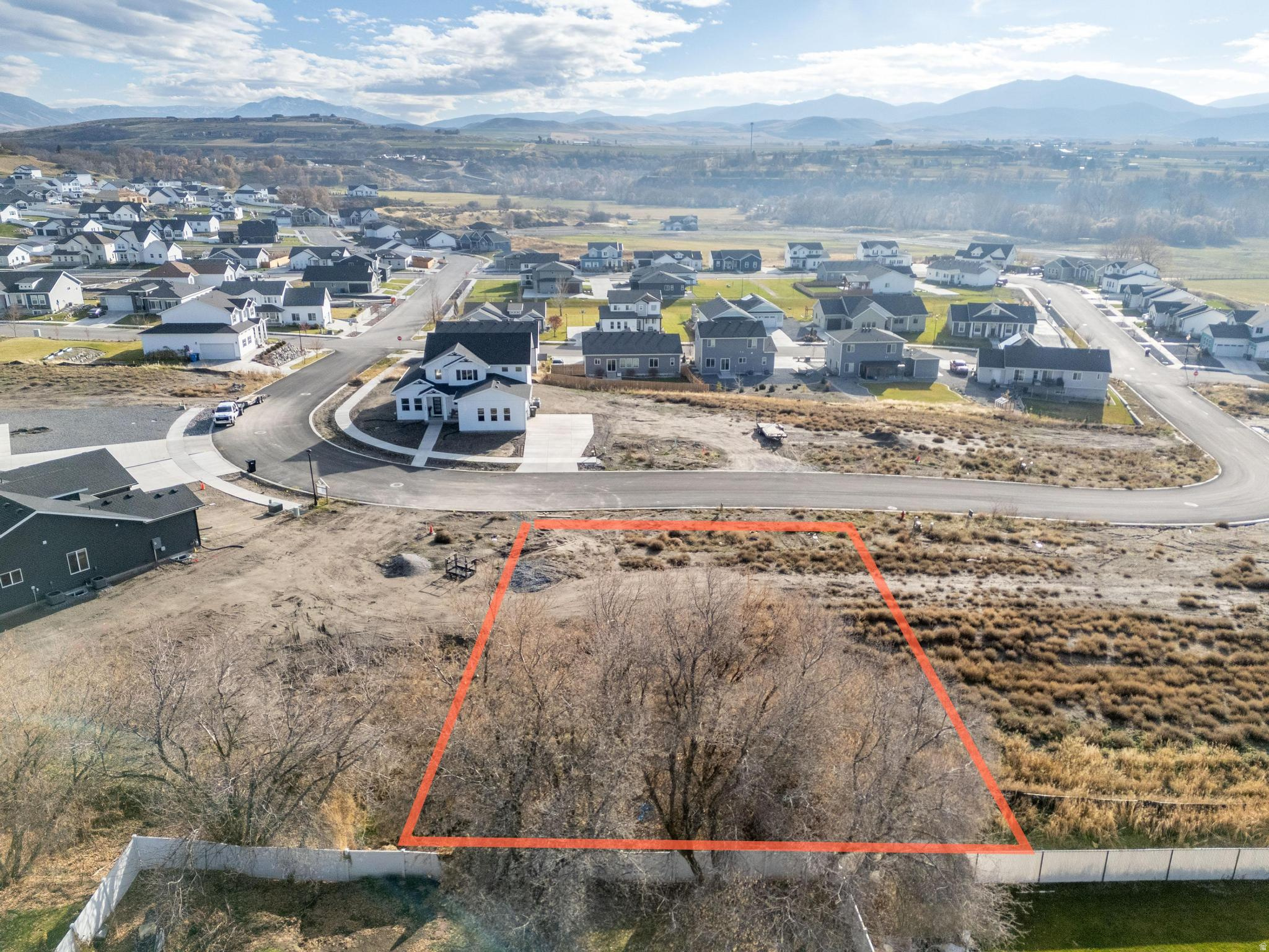 LOT 86  Mount Sterling Farms is a picturesque community located in Hyrum, Utah. This community has the best in homes, parks, and views. One of the parks has a splash pad, pickleball and basketball courts!  Mount Sterling Farms offers homeowners a chance to escape the busy, fast-paced city life, and live where kids can spend their days playing outside with friends at the park or on the splash pad. There's a lot to do in your own neighborhood, and there are many different types of outdoor recreation just minutes away! If you are looking to build a new home in Hyrum, you will find everything you are looking for in this exclusive neighborhood.