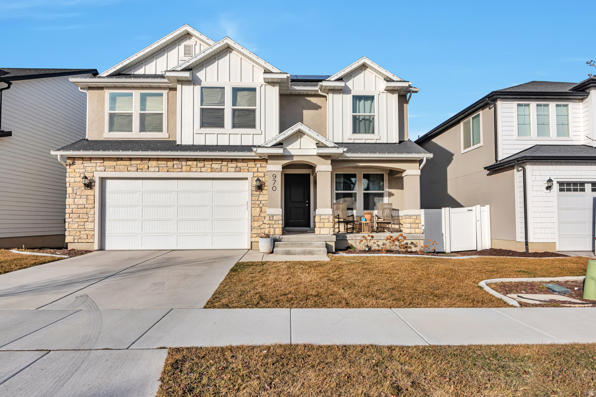 Welcome to this beautiful two-story home in the heart of Bluffdale, offering space, style, functionality, and brand new carpet throughout. From the inviting formal living room or den to the majestic great room featuring a cozy fireplace, this home is designed for comfortable living and entertaining. The modern kitchen boasts a large island, ample workspace, and an open layout perfect for gathering with family and friends. Upstairs, you'll find a versatile secondary family room that can serve as a media area, office, or play space. The spacious primary suite includes a luxurious bath with double vanities and a separate tub and shower. The finished basement provides even more living space with an additional bedroom and a large family room ideal for movie nights or recreation. Conveniently located near freeway access and all the growth and amenities Bluffdale has to offer, this property also features the rare bonus of having no neighbors directly behind. For an extra bonus, this home has Solar Panels! Priced right and ready for a quick showing.