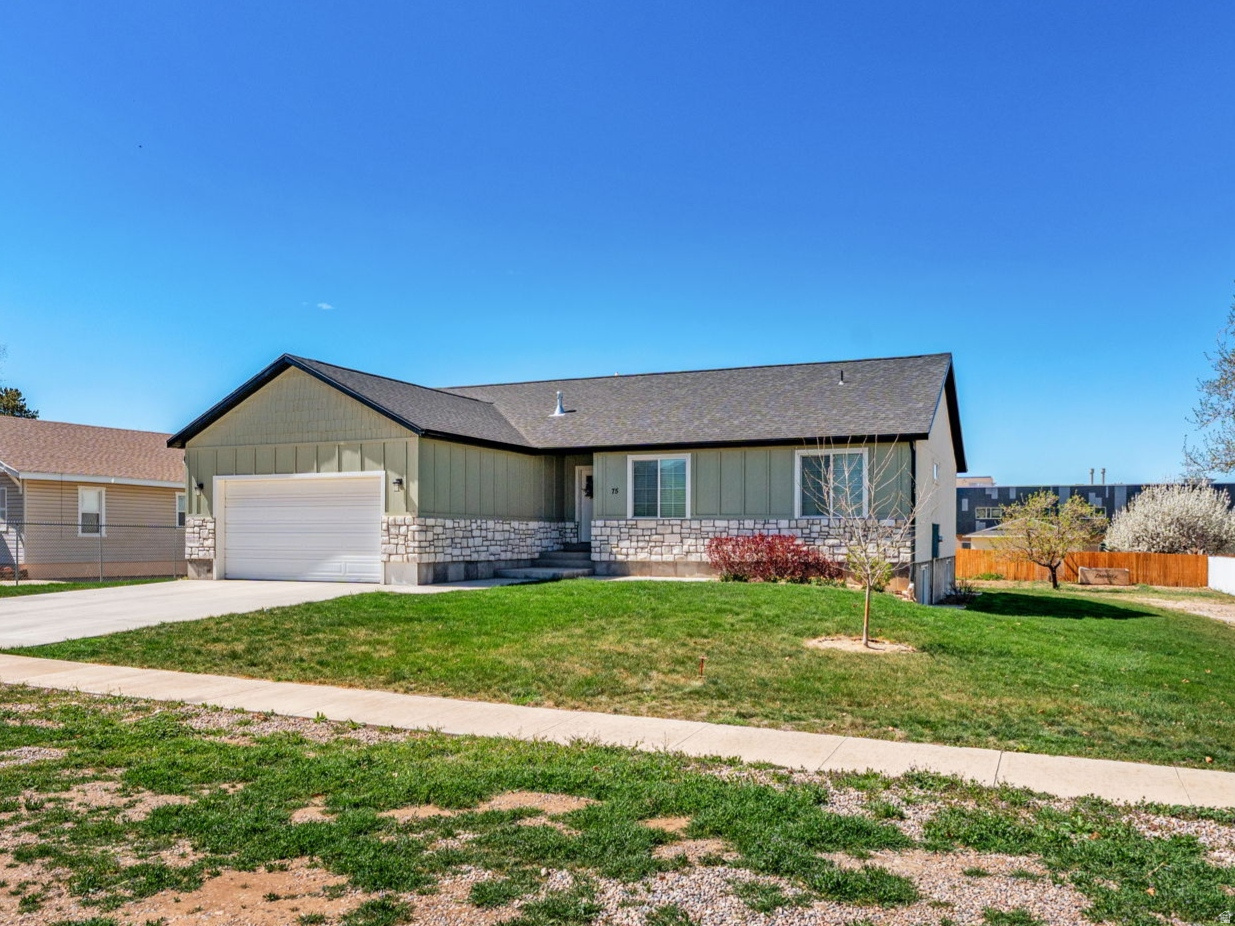 Custom home with 5 beds/3 baths, including a fully finished basement. You'll love the main level living, and the bonus set up to allow for a full apartment in the basement with it's own entrance and lots of natural light throughout. Large barn in the back yard is set up for several potential uses and workshop spaces. Includes 1/4 share of irrigation water. Fun yard has space for chickens and other small livestock. Centrally located in Fillmore, nearby schools, swimming pool, library, retail, and dining. Plenty of parking for trailers and toys. This is a great home if you are looking for a lot of space, inside and out!