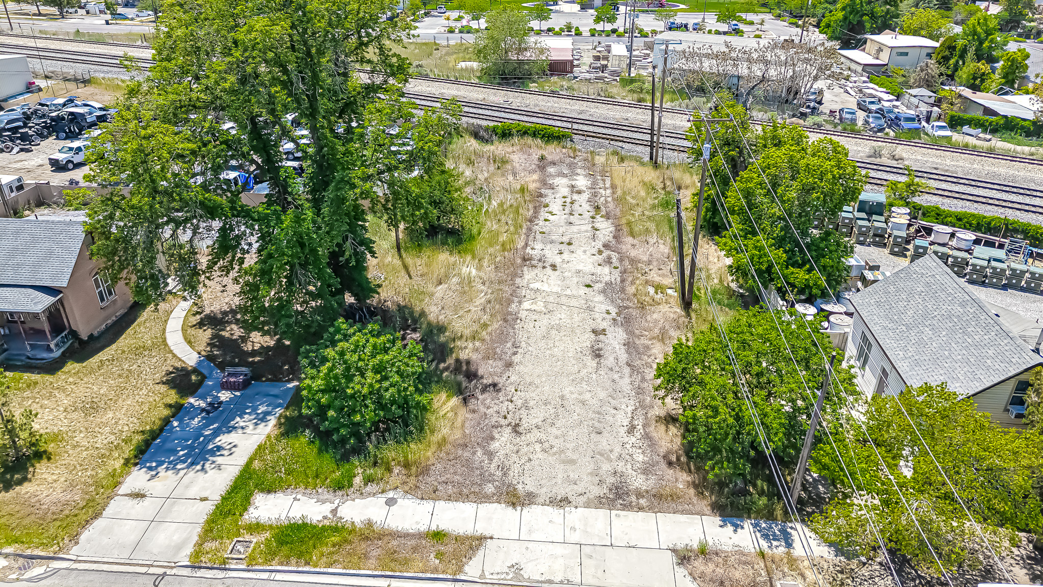 Exceptional multi-family development opportunity in the heart of Provo! This rare half-acre building lot offers incredible potential for 45 residential units and is ideally located near downtown Provo, shopping, restaurants, schools, and the FrontRunner commuter rail for easy access throughout Utah County and beyond. Utilities are readily available with power, gas, water, and sewer either stubbed to the property or located in the road, helping simplify the development process. With strong rental demand in the area and convenient access to BYU, UVU, I-15, and public transportation, this property is perfectly positioned for investors, builders, and developers looking to capitalize on one of Utah County's most desirable and growing markets. Opportunities like this are becoming increasingly difficult to find - don't miss your chance to build in a prime Provo location!