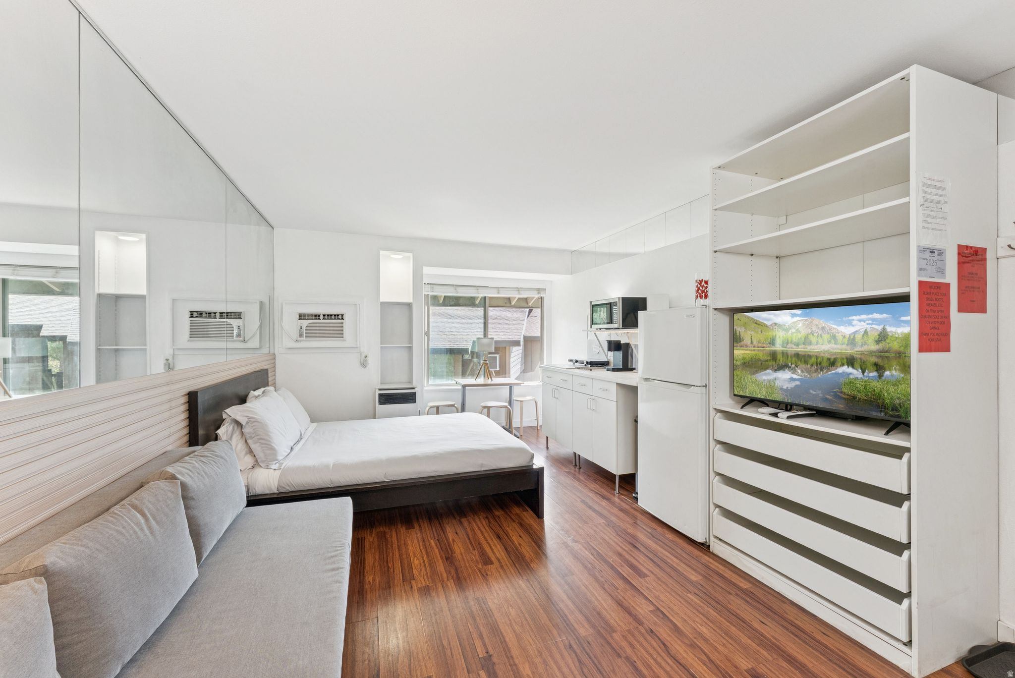 Turnkey top-floor corner studio in Park City's Prospector Square zoned for nightly rentals and ideally located for strong year-round demand. Updated in 2015 and offered fully furnished, this 295 sq ft unit overlooks the Rail Trail and sits just steps from the free City bus line, providing direct access to Park City Mountain Resort, Deer Valley, Main Street, and Kimball Junction.  Tenants and guests will love the walkability to restaurants, shops, and Silver Mountain Sports Club, plus the convenience of on-site amenities including a year-round hot tub, seasonal pool, firepit, lounge area, and 24-hour front desk. Low maintenance, high desirability, and flexible use make this an excellent addition to any short-term rental portfolio or a low-entry-point second home in the heart of Park City.