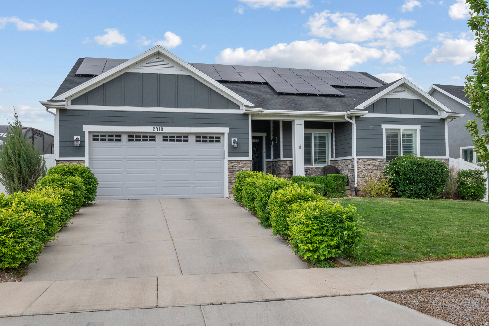 NEW PRICE IMPROVEMENT realigned to recent comps in the neighborhood offering a strong competitive value!!  This beautiful well designed open-concept rambler home is nestled on a corner lot  offering unobstructed breathtaking views of the Wasatch mountains and lush green open spaces.  An incredible added value is the seller FULLY OWNED and PAID for 10,000 KW solar panel system SAVING YOU THOUSANDS of DOLLARS in energy bills!! The system is highly upgraded to include 2 inverters and 3 back up 3500 KW batteries connected to an ecoflow smart panel. The chef inspired kitchen features quartz countertops, upgraded cabinets, a premium gas range with integrated oven and stainless steel appliances. There is space in the basement to add an additional 3 bedrooms and bathroom creating more value and more equity for you!  On the main floor, the spacious primary suite has en-suite bathroom featuring a luxuious soaking tub, a granite-topped vanity, a seamless glass walk-in shower, and a  generous walk in closet.  Additional upgraded features include a REME HALO in-duct airpurifer system, a water softener, RV PARKING and shed included. The private backyard has vinyl fencing with garden beds and fruit trees. Located directly across the street from the coveted Legacy Farms neighborhood park this home is close to walking and bike paths offering outdoor open spaces. The new upcoming Harmon's grocery store is minutes away and Spanish Fork offers a new amazing recreation center, "Fit City" . This neighborhood and house is truly a wonderful place to call home! Square footage figures are provided as a courtesy estimate only and were obtained from county records.  Buyer is advised to obtain an independent measurement.
