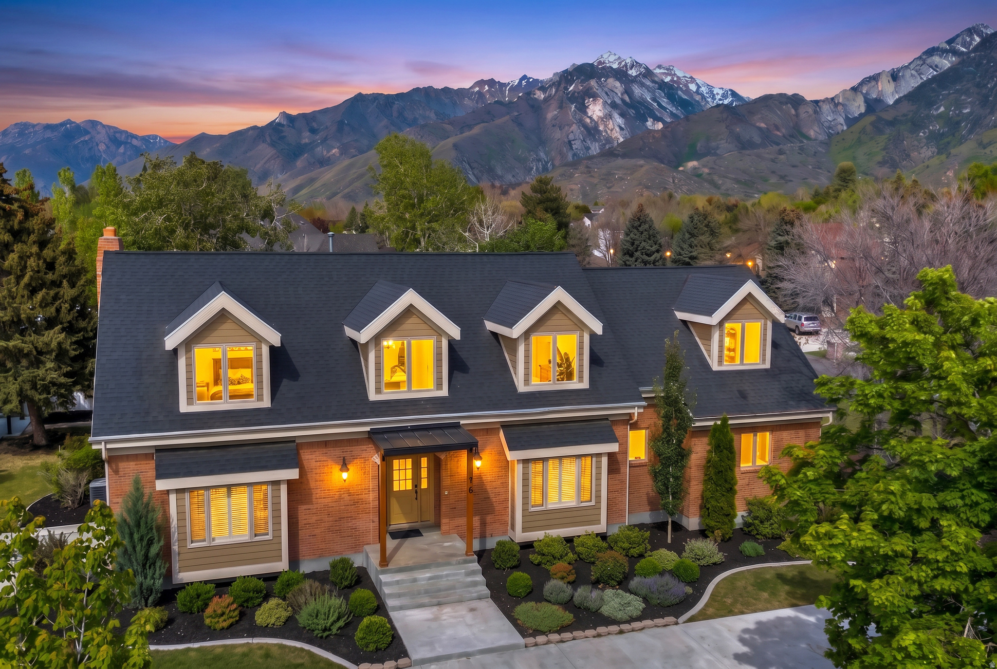 Nestled in the prestigious Pepperwood community, one of the most coveted gated 24hr security enclaves, this estate presents a masterful expression of luxury living - completely and brilliantly reimagined from top to bottom. Every detail has been meticulously crafted and designed to create a harmonious blend of timeless elegance and modern sophistication, where elevated finishes, rich textures, and a highly functional new layout come together effortlessly.  Anchoring the main living spaces, a stunning gourmet kitchen opens gracefully through expansive accordion doors to a rear pergola covered deck designed for seamless indoor-outdoor entertaining. The spa-like primary suite offers a quiet sanctuary with sunny sitting area, a unique soaking tub, separate walk-in shower, dual sinks and a huge walk-in closet.  A secondary main-level en-suite is perfectly suited for guests or multi-generational living with 2nd laundry area.  Thoughtfully designed spaces enhance the home's versatility and appeal, including a distinguished executive office, a tranquil yoga studio, an open-concept theater room equipped with Sonos audio and a wet bar, and a children's retreat, all intentionally crafted to enrich everyday living.  Set on a flat half-acre on the picturesque Wasatch Front mountains while offering the convenience of both a guest 1/2 circle driveway and a separate owner's drive, an uncommon and highly sought-after feature with room to build a secondary garage.  Pepperwood isn't just a neighborhood, it's a lifestyle w/exceptional amenities, including a resort-style pool, pickleball, basketball and tennis courts, clubhouse, covered pavilion, sand volleyball and scenic walking trails, all supported by a remarkably low HOA.  Minutes from world class skiing, renowned medical facilities, premier shopping, dining, entertainment, spas, and fitness facilities.