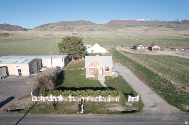 Zoned Highway Commercial in Dayton, Idaho.  Former home of Sunrise Manufacturing, this blank canvas is ready for your next great idea!  Historic barn on property that has been a landmark for many years.  2 sheds, 30x60 and 30x90 highlight the commercial possibilities.  Come take a look and bring your ideas for future business.  Buyer to verify all information.