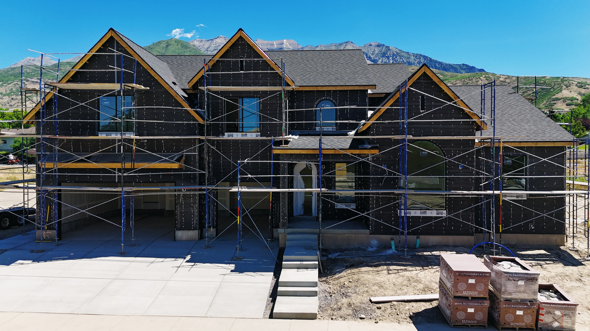 Discover a brand-new custom floorplan designed specifically for this exceptional lot in Orem. This stunning two-story home features a luxurious primary suite on the main level, blending comfort, convenience, and timeless style. Perfectly situated backing directly to the scenic Murdock Canal Trail, this home offers direct access to miles of walking and biking trails while nestled near the mountains with beautiful surroundings. Located minutes from the former WordPerfect campus, the location combines privacy and convenience.   Inside, you'll find expansive square footage loaded with designer-selected finishes and elevated details throughout. Spacious gathering areas, oversized bedrooms, and flexible living spaces create room for entertaining and everyday living. The basement includes a separate entrance with excellent potential for a future ADU, multigenerational living, or additional family space. A rare opportunity to own a designer home in one of Orem's most desirable locations. Scheduled to finish end of July.