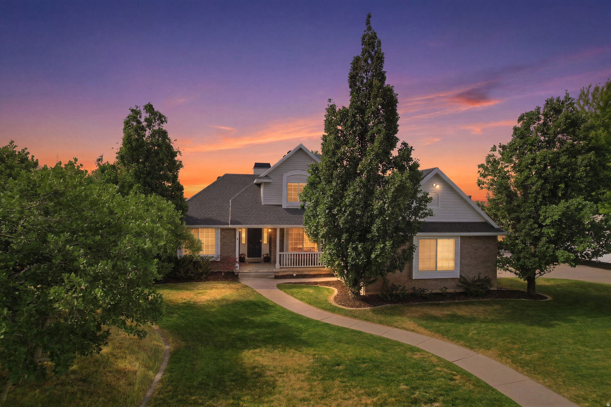 Nestled at the end of a quiet cul-de-sac with breathtaking mountain and valley views, this spacious South Ogden home offers the privacy, yard, and flexible living space today's buyers are searching for. Situated on a .40-acre lot with mature landscaping, this 4-bedroom, 4-bath home features over 3,300 square feet of thoughtfully designed living space, including vaulted ceilings, quartz countertops, a cozy fireplace, central vacuum, and a relaxing jetted tub in the MAIN FLOOR primary suite. The fully finished basement includes a dedicated home gym, expansive family room with fireplace, and full bath and bedroom. The attached 2-car garage offers a generous extra-width storage/workshop area and a Tesla Charger. Tuff Shed included. Don't miss your opportunity to make this exceptional South Ogden home yours!