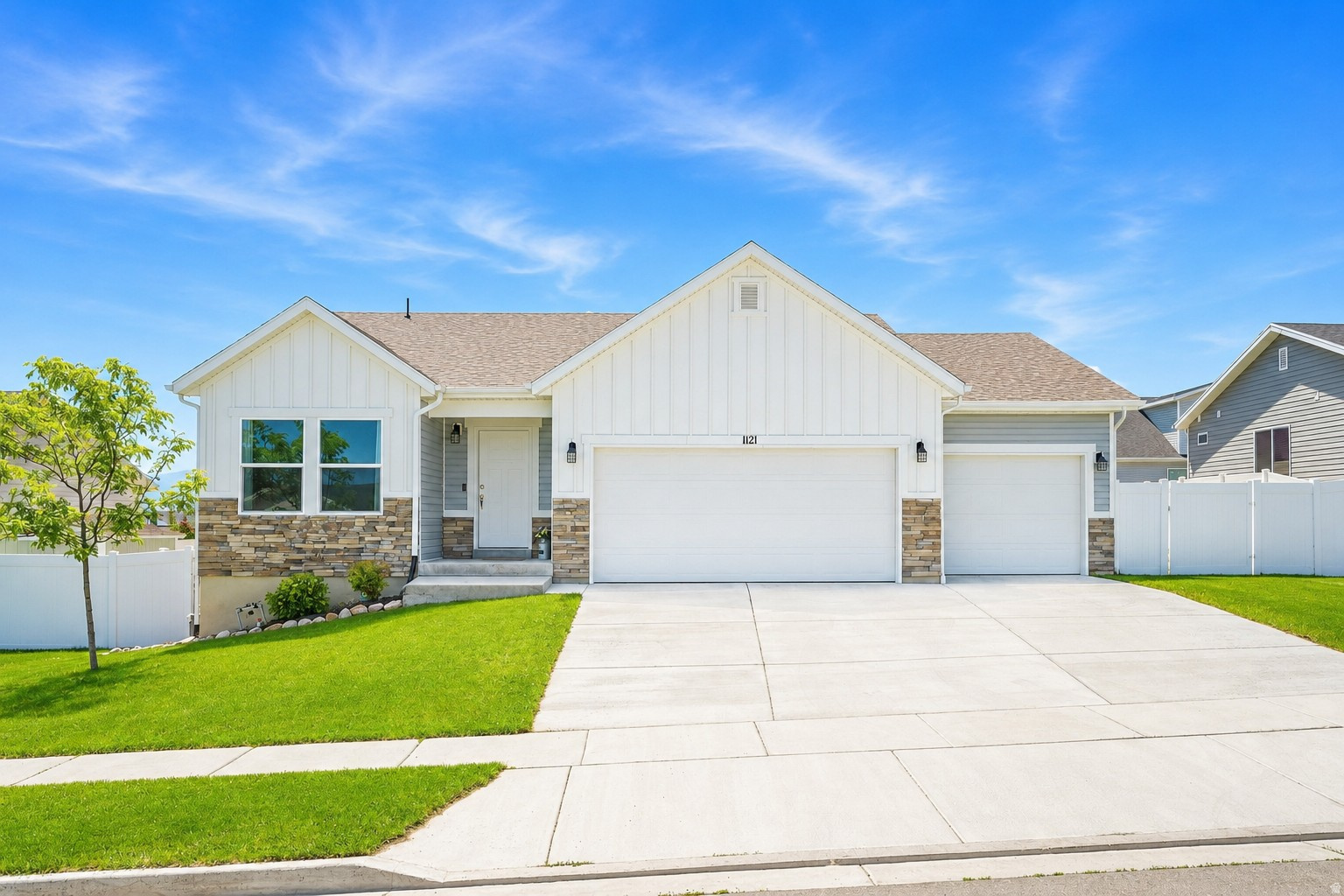 Beautiful like-new home in a quiet new neighborhood. 4 car garage, the 3rd bay is double deep. Includes Solar Panels which gives you a much lower electricity bill.  Open concept great room, granite counter tops with a kitchen island, gas range, black and stainless steel appliances. 3 bedrooms and 2 bathrooms on the main level, including laundry room with gas and electric hookups. Primary suite has a large bedroom with adjoining bathroom and big walk-in closet. Water softening system, tankless water heater. Fully fenced back yard, nice covered front porch. Room to grow in the full unfinished basement.