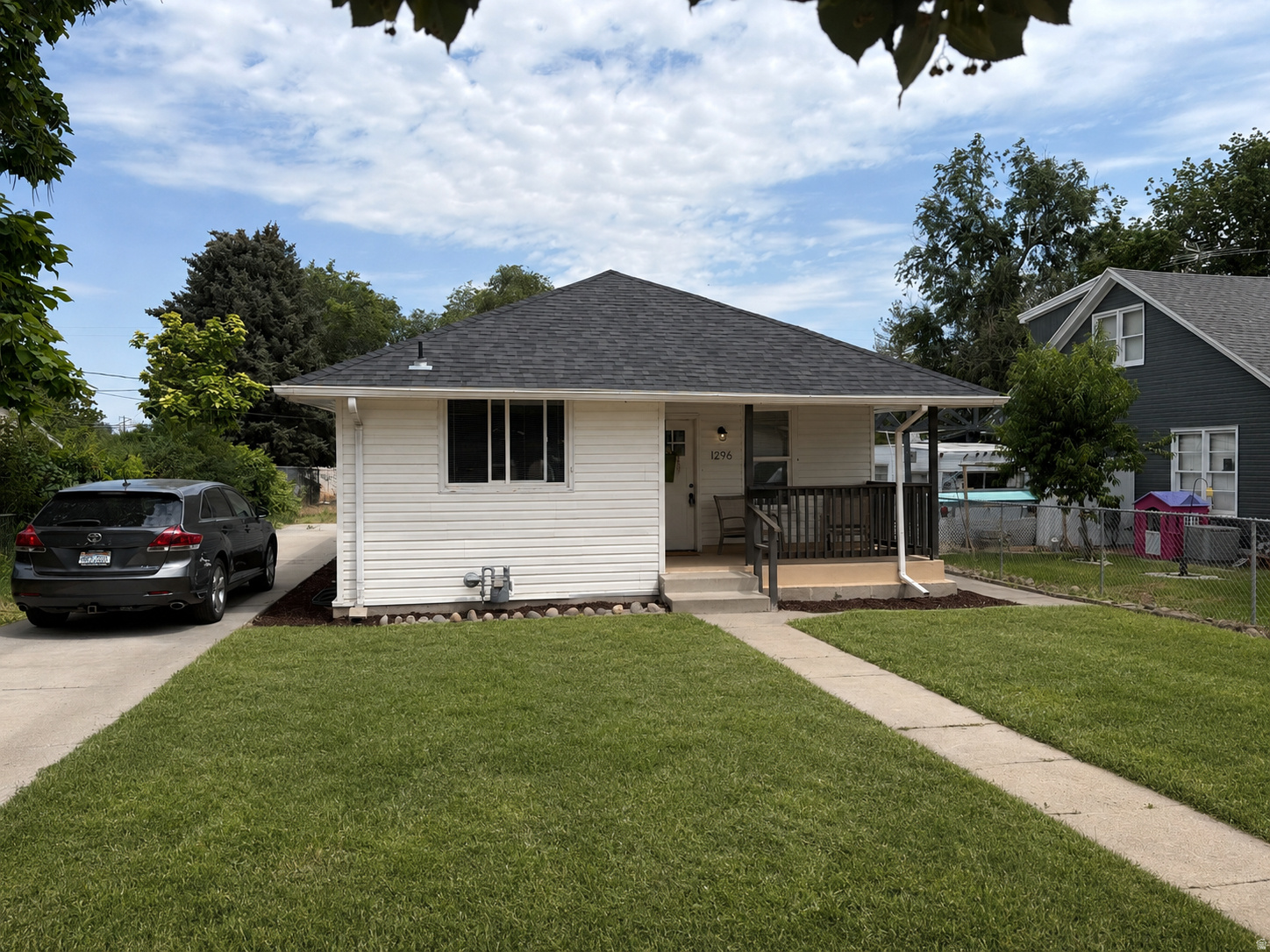 ***OPEN HOUSE 07/18/26 11-1***Exceptional opportunity in Salt Lake City's Rose Park! This versatile home offers just under 1,000 square feet on each level with 2 bedrooms and 1 bathroom upstairs, plus a fully finished lower level featuring 2 additional bedrooms, 1 bathroom, a kitchen, private separate entrance, and its own washer and dryer hookups. Perfect for multi-generational living, roommates, or added income potential. Recent updates include a newer roof, furnace, central air conditioning, updated windows, new carpet, and an updated kitchen with stainless steel appliances. Conveniently located just minutes from downtown, parks, shopping, and freeway access, this move-in-ready home offers flexibility, value, and endless possibilities for first-time buyers, investors, or anyone looking to maximize their investment.