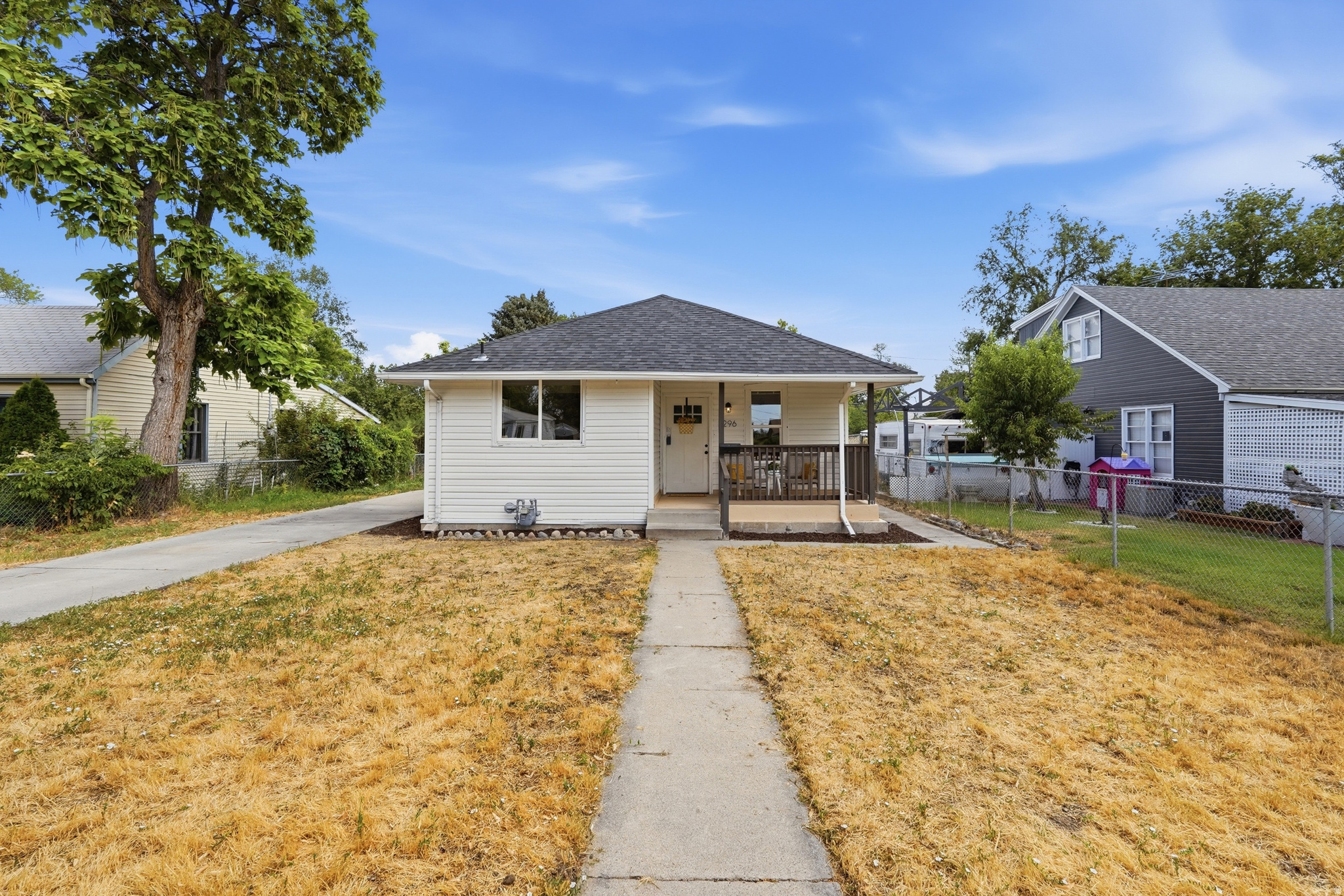 ***OPEN HOUSE 07/18/26 11-1***Exceptional opportunity in Salt Lake City's Rose Park! This versatile home offers just under 1,000 square feet on each level with 2 bedrooms and 1 bathroom upstairs, plus a fully finished lower level featuring 2 additional bedrooms, 1 bathroom, a kitchen, private separate entrance, and its own washer and dryer hookups. Perfect for multi-generational living, roommates, or added income potential. Recent updates include a newer roof, furnace, central air conditioning, updated windows, new carpet, and an updated kitchen with stainless steel appliances. Conveniently located just minutes from downtown, parks, shopping, and freeway access, this move-in-ready home offers flexibility, value, and endless possibilities for first-time buyers, investors, or anyone looking to maximize their investment.